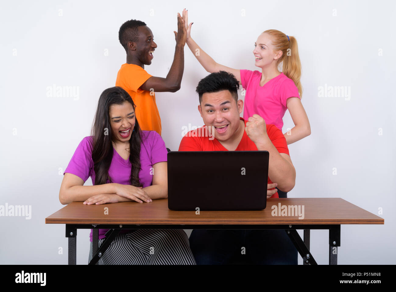 Diverse group people high five hi-res stock photography and images - Alamy