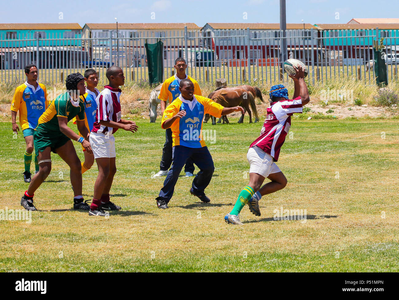 Cape Town, South Africa, December 06, 2011, Diverse children playing Rugby at school Stock Photo