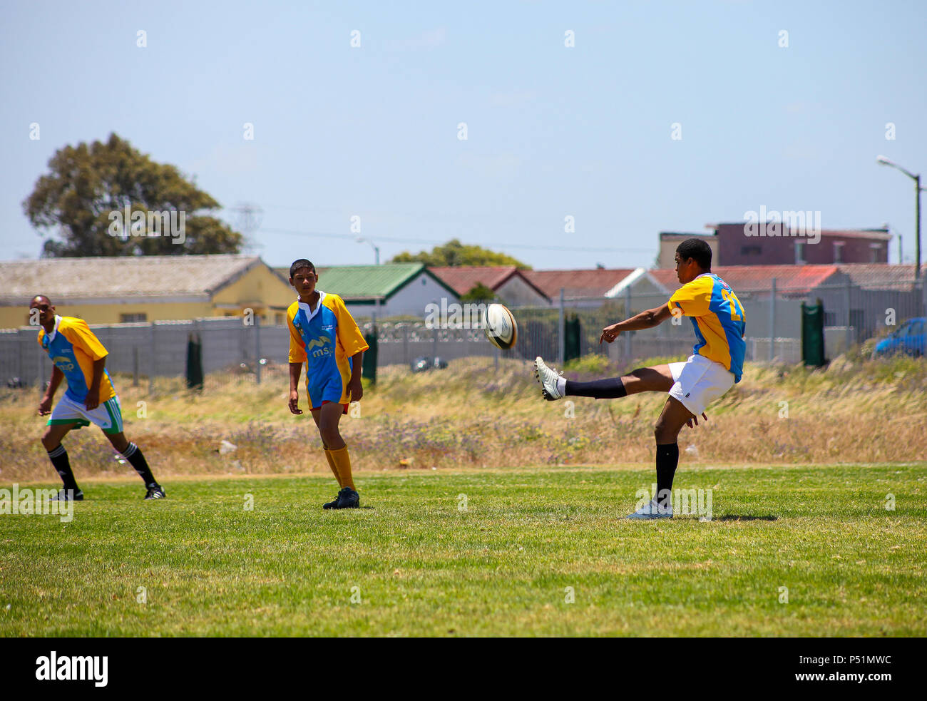Cape Town, South Africa, December 06, 2011, Diverse children playing Rugby at school Stock Photo