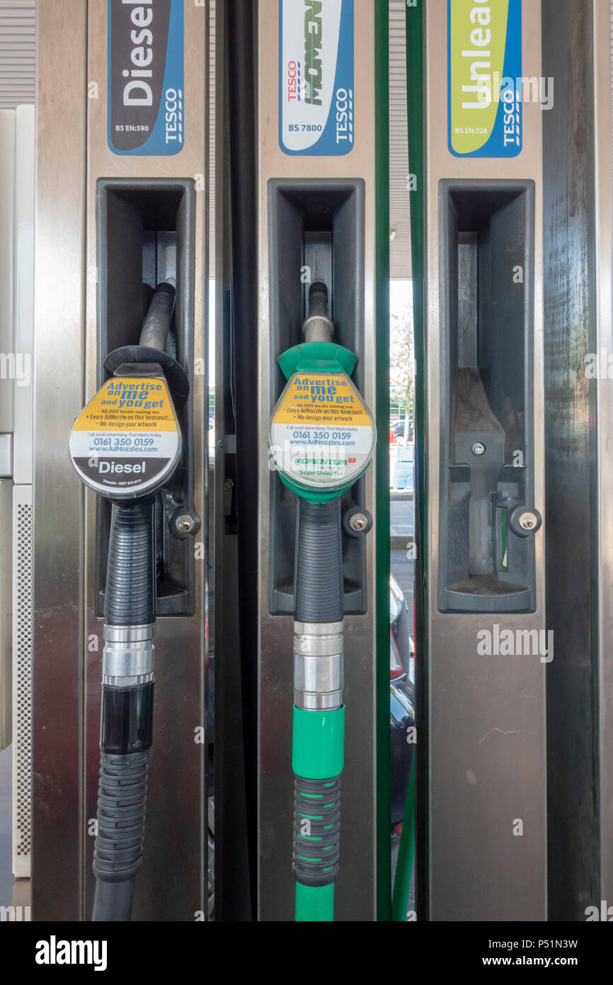 Petrol pumps at Tesco fuel station Stock Photo - Alamy