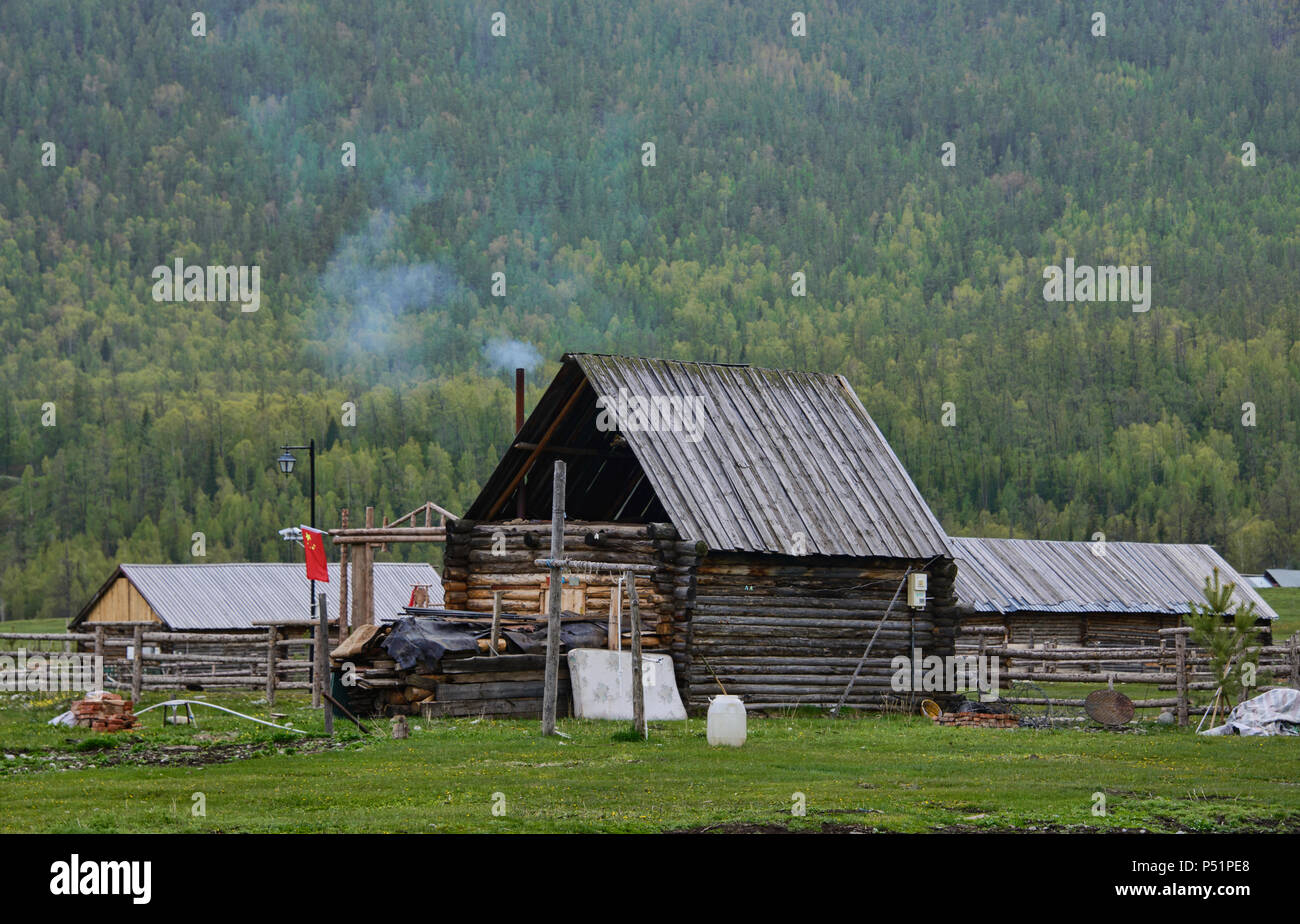 Wood home in ethnic Tuvan village, Kanas Lake National Park, Xinjiang ...