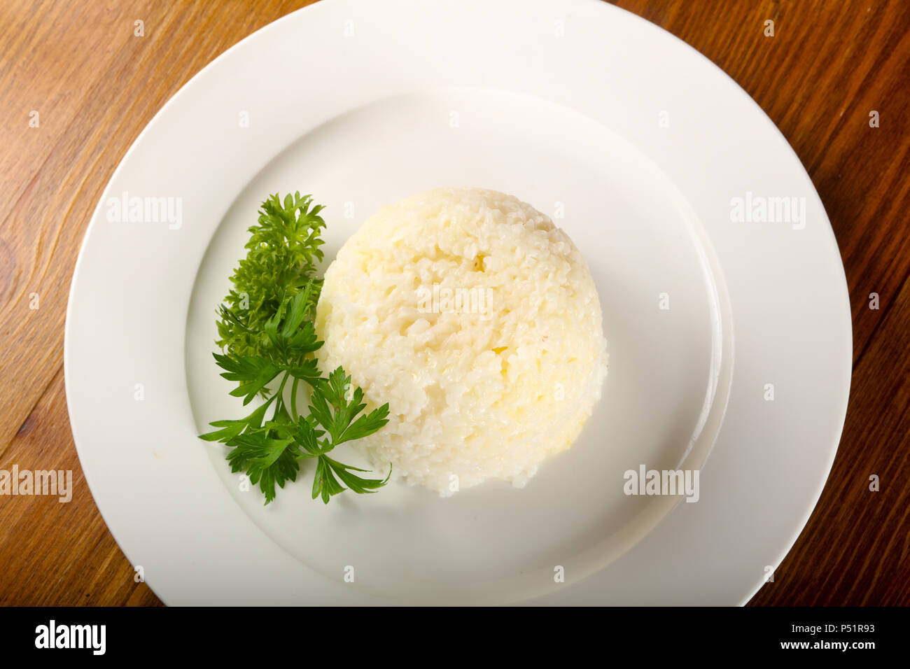 Steamed rice with parsley Stock Photo - Alamy