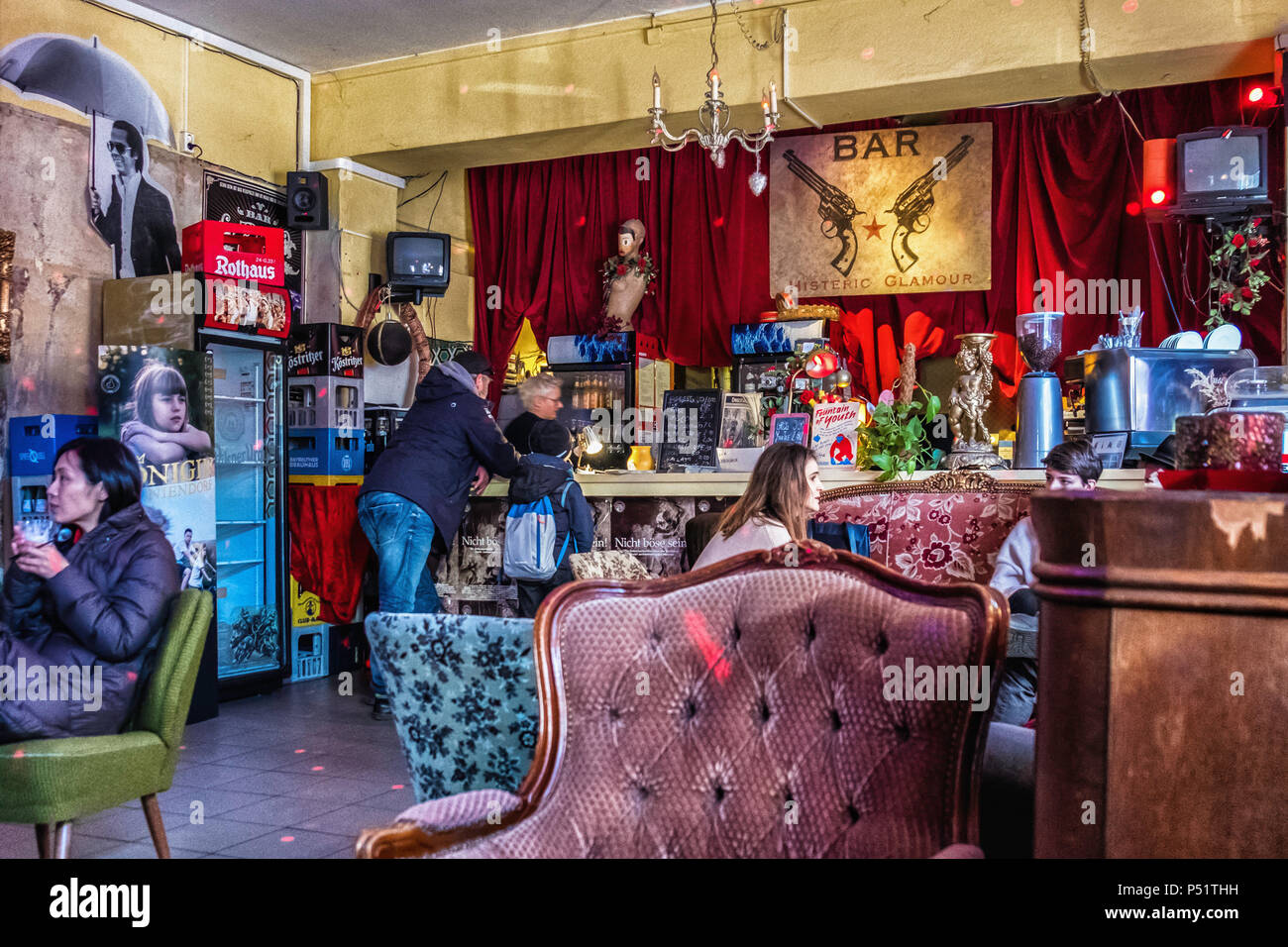 Berlin, Friedrichshain.B-ware Laden Kino, Corner cinema and video library  interior - café & bar with period furniture, movie posters & memorabilia  Stock Photo - Alamy