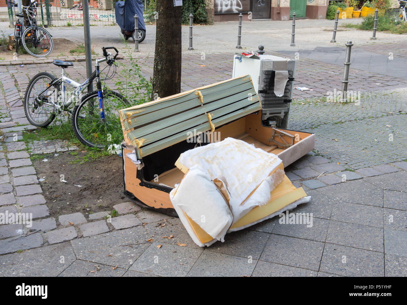 Illegally parked bulky waste in the streets of Berlin Stock Photo