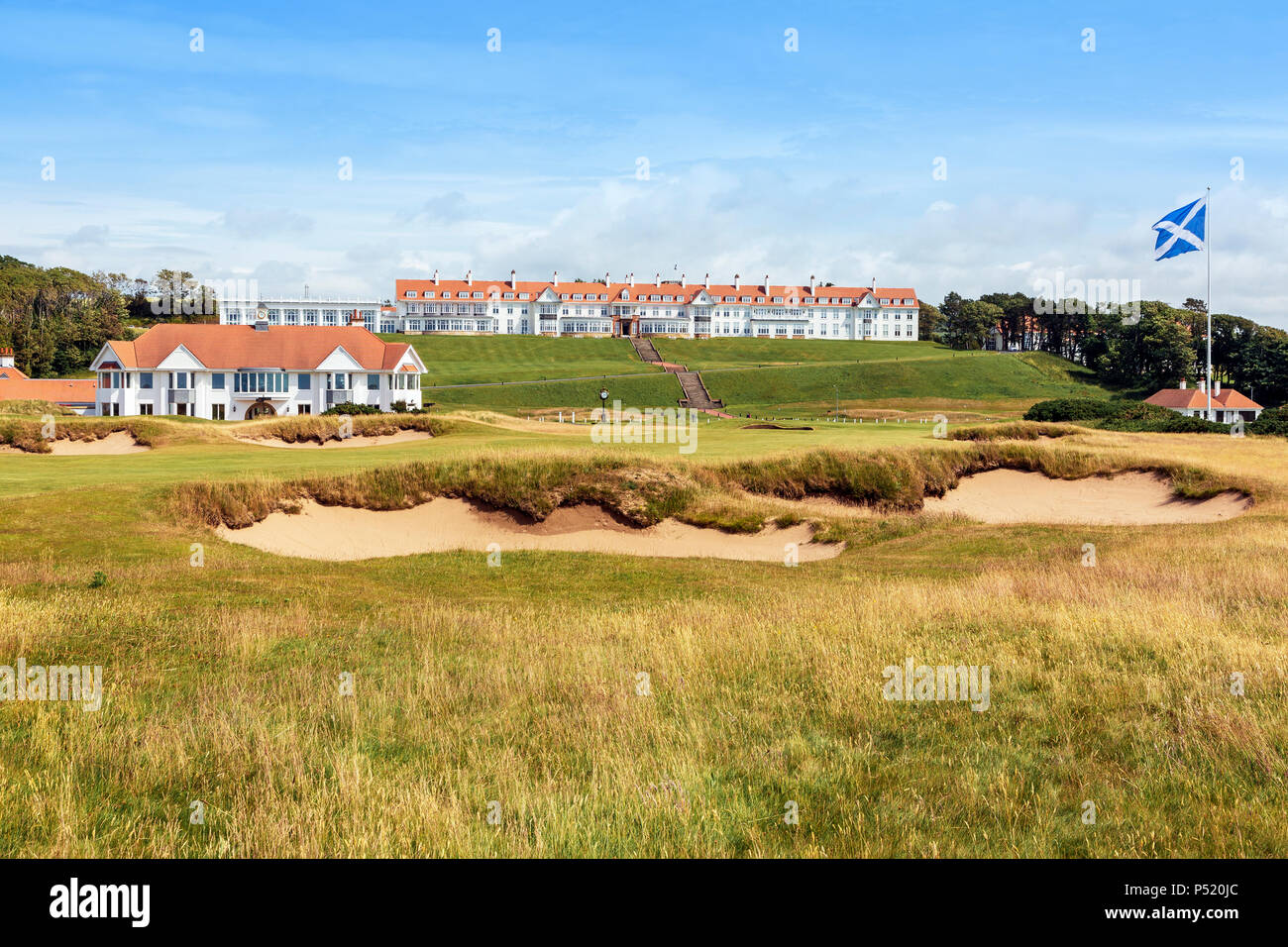 Trump Turnbery hotel and Golf complex with a view to the hotel and golf clubhouse across the 18th fairway of the Ailsa Course, Turnberry, Ayrshire, Sc Stock Photo