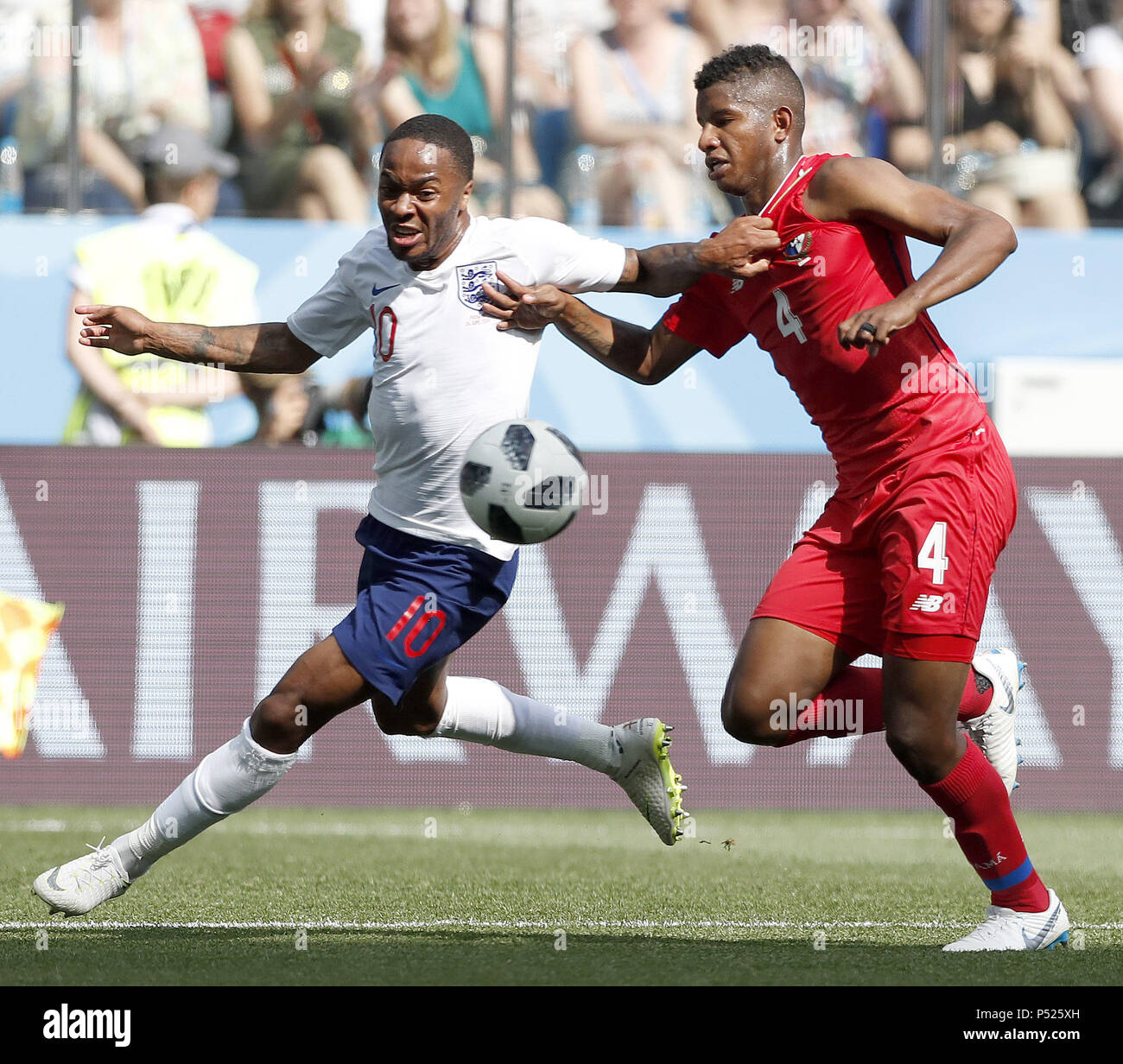 Nizhny Novgorod, Russia. 24th June, 2018. Fidel Escobar (R) of Panama vies with Raheem Sterling of England during the 2018 FIFA World Cup Group G match between England and Panama in Nizhny Novgorod, Russia, June 24, 2018. Credit: Cao Can/Xinhua/Alamy Live News Stock Photo