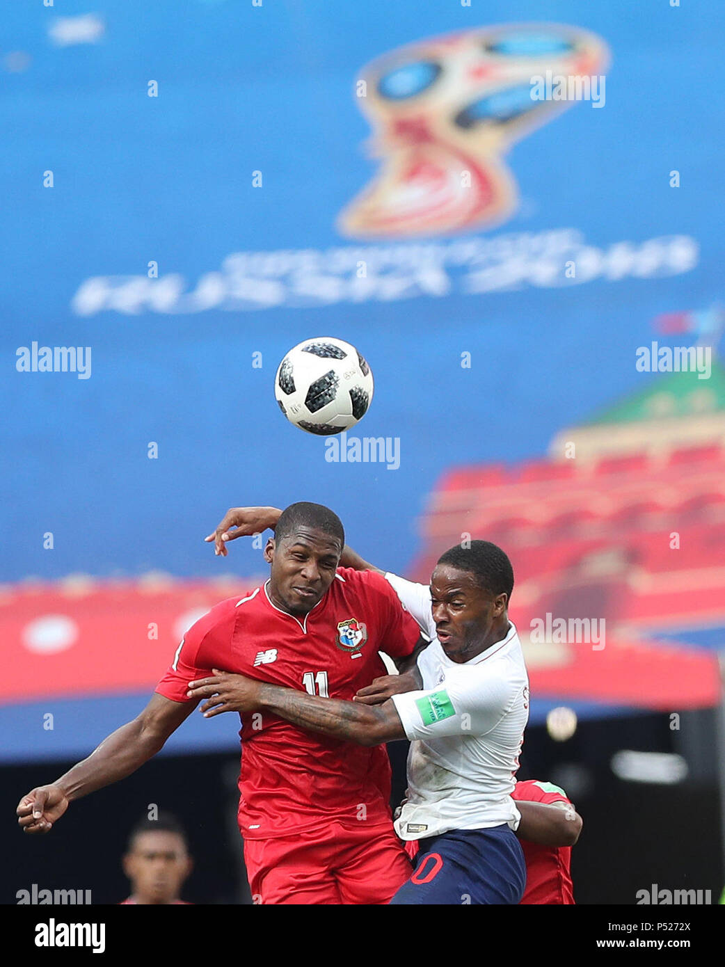 Nizhny Novgorod, Russia. 24th June, 2018. Raheem Sterling (R) of England competes for a header with Armando Cooper of Panama during the 2018 FIFA World Cup Group G match between England and Panama in Nizhny Novgorod, Russia, June 24, 2018. Credit: Xu Zijian/Xinhua/Alamy Live News Stock Photo
