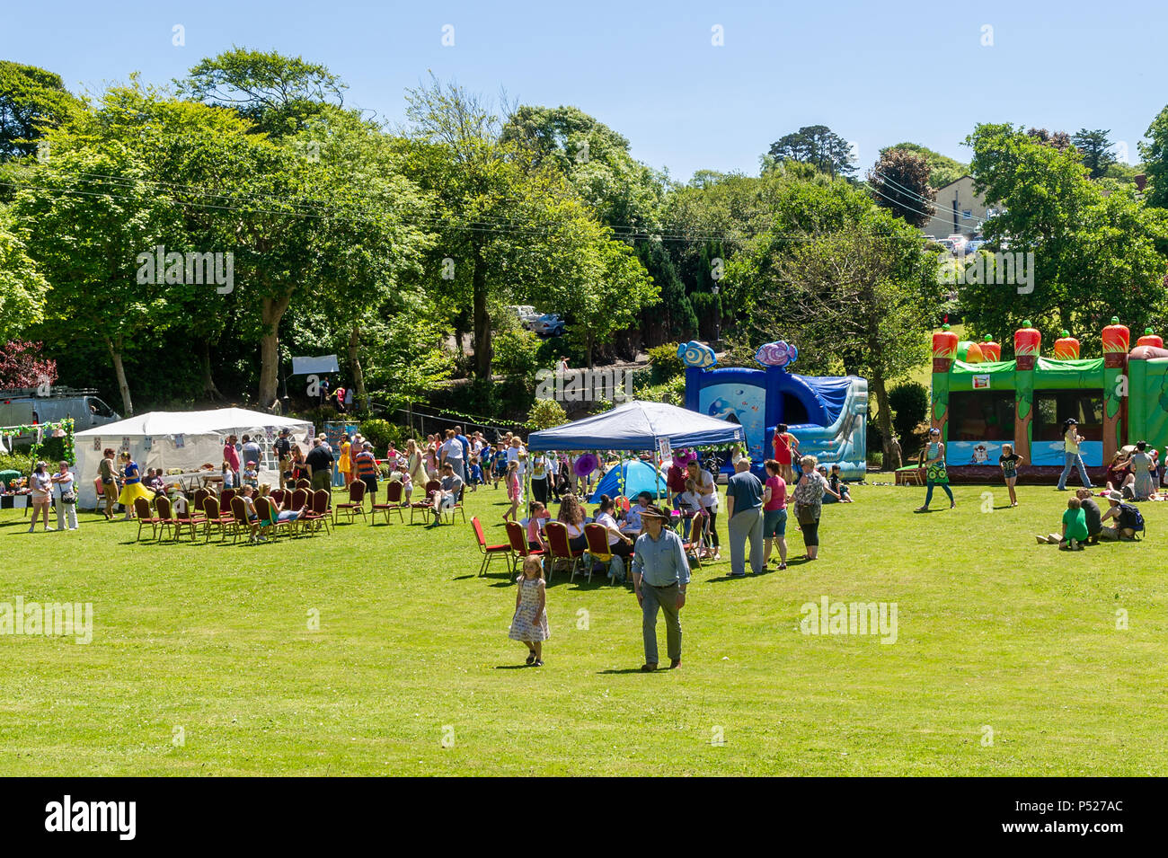 Bantry, Ireland. 24th June, 2018. Bumbleance - the Official Children's National Ambulance Service of Ireland is a crucial service for sick children. A fundraiser was held at Westlodge Hotel, Bantry today in scorching sunshine with Alice in Wonderland being the fancy dress theme. Credit: Andy Gibson/Alamy Live News. Stock Photo