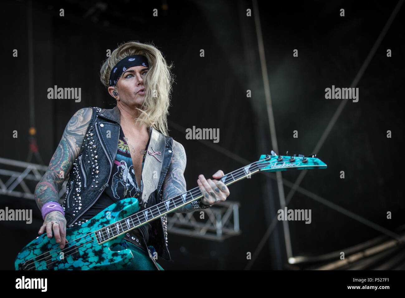 Denmark, Copenhagen - June 23, 2018. The American glam metal band Steel Panther performs a live concert during the Danish heavy metal festival Copenhell 2018 in Copenhagen. Here bass player Lexxi Foxx is seen live on stage. (Photo credit: Gonzales Photo - Thomas Rasmussen). Credit: Gonzales Photo/Alamy Live News Stock Photo