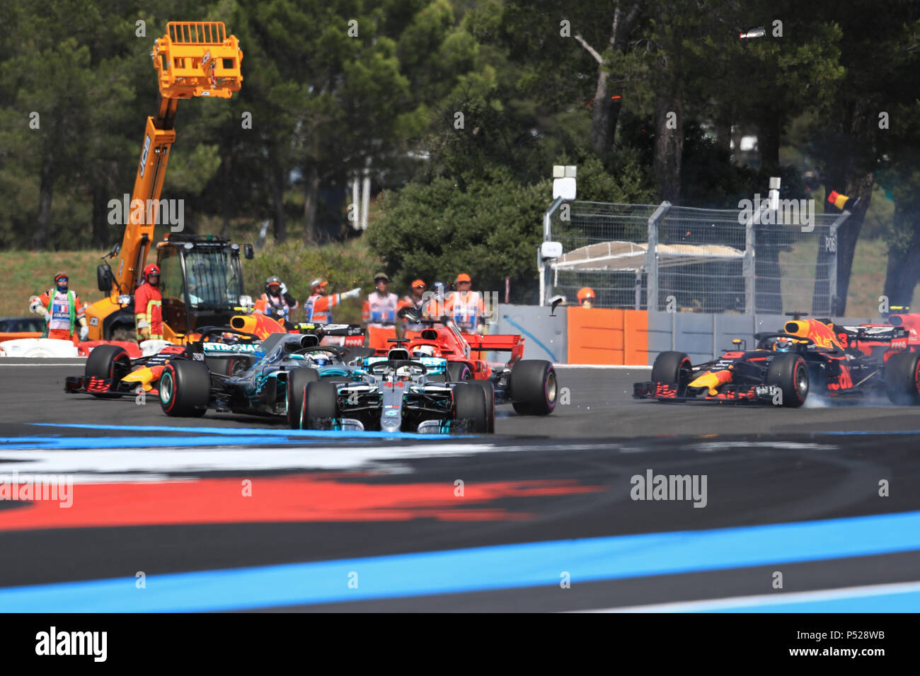 Le Castellet, France. 24 June 2018.  French Formula One Grand Prix, race day; Mercedes AMG Petronas Motorsport, Lewis Hamilton leads as Vettel causes a collission with Bottas Credit: Action Plus Sports Images/Alamy Live News Credit: Action Plus Sports Images/Alamy Live News Stock Photo