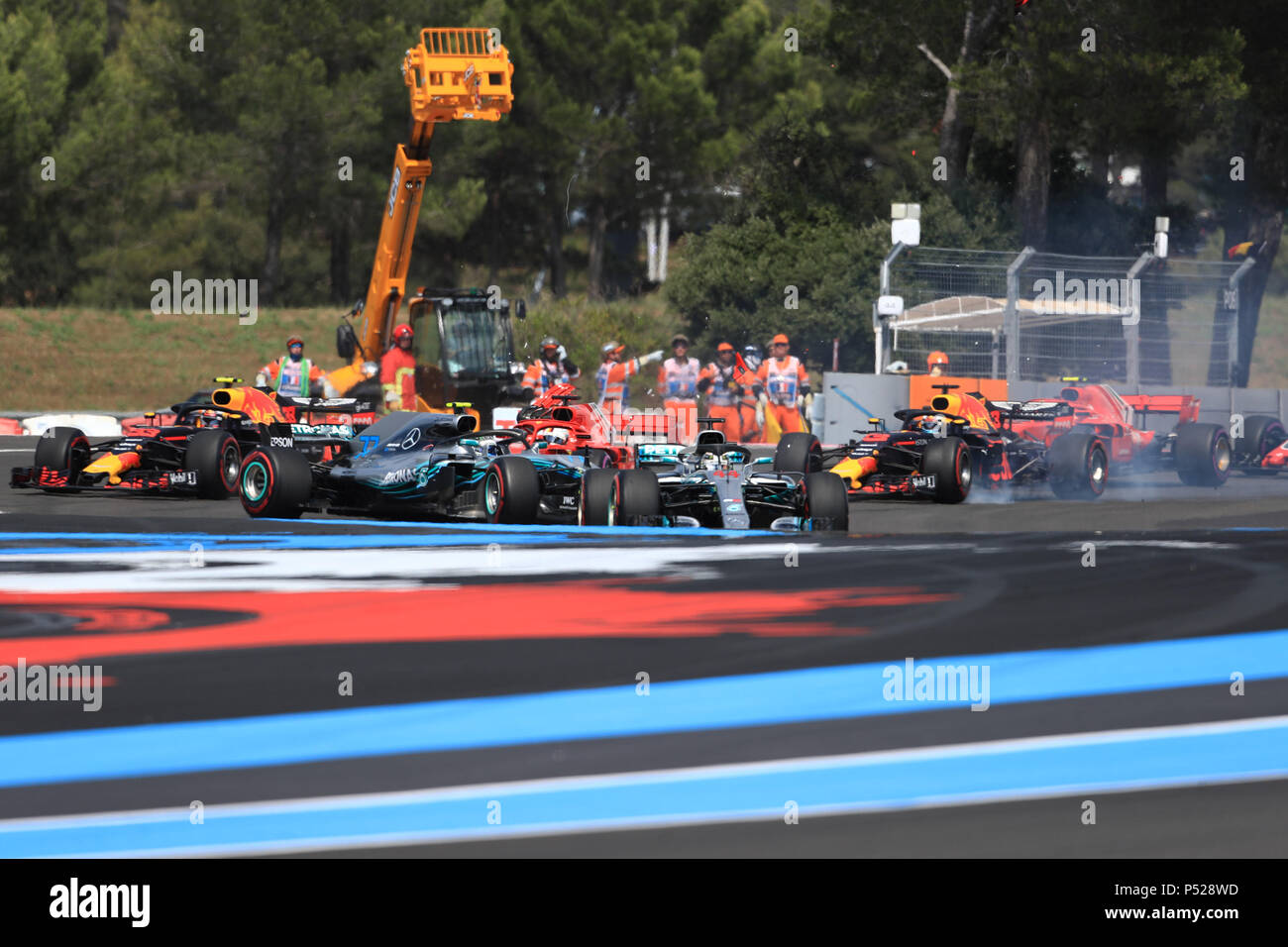 Le Castellet, France. 24 June 2018.  French Formula One Grand Prix, race day; Mercedes AMG Petronas Motorsport, Lewis Hamilton leads as Vettel causes a collission with Bottas Credit: Action Plus Sports Images/Alamy Live News Credit: Action Plus Sports Images/Alamy Live News Stock Photo