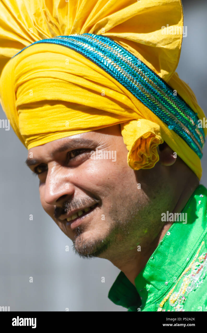 Glasgow, Scotland, UK. 24th June, 2018. A member of the traditional bhangra dance group Gabhru Panjab De performing at Glasgow Mela, an annual multicultural music festival held in Kelvingrove Park. This year's Glasgow, Scotland, UK. 24th June, 2018. A member of the traditional bhangra dance group Gabhru Panjab De performing at Glasgow Mela, an annual multicultural music festival held in Kelvingrove Park. This year's
