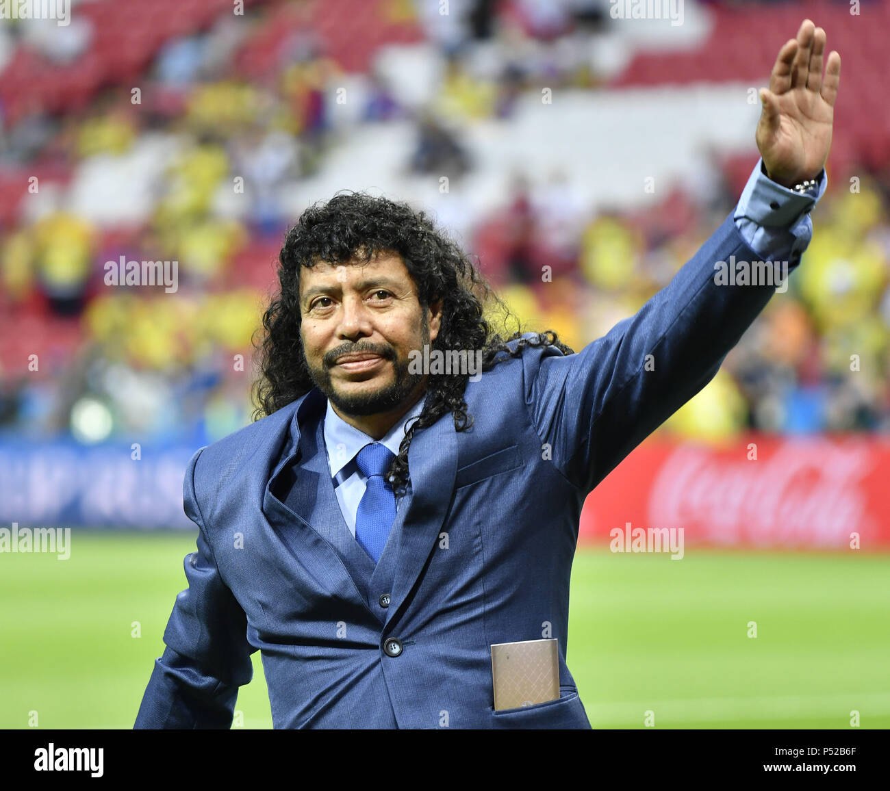 Kazan, Russia. 24th June, 2018. Former Colombia's goalkeeper Rene Higuita greets the audience prior to the 2018 FIFA World Cup Group H match between Poland and Colombia in Kazan, Russia, June 24, 2018. Credit: He Canling/Xinhua/Alamy Live News Stock Photo