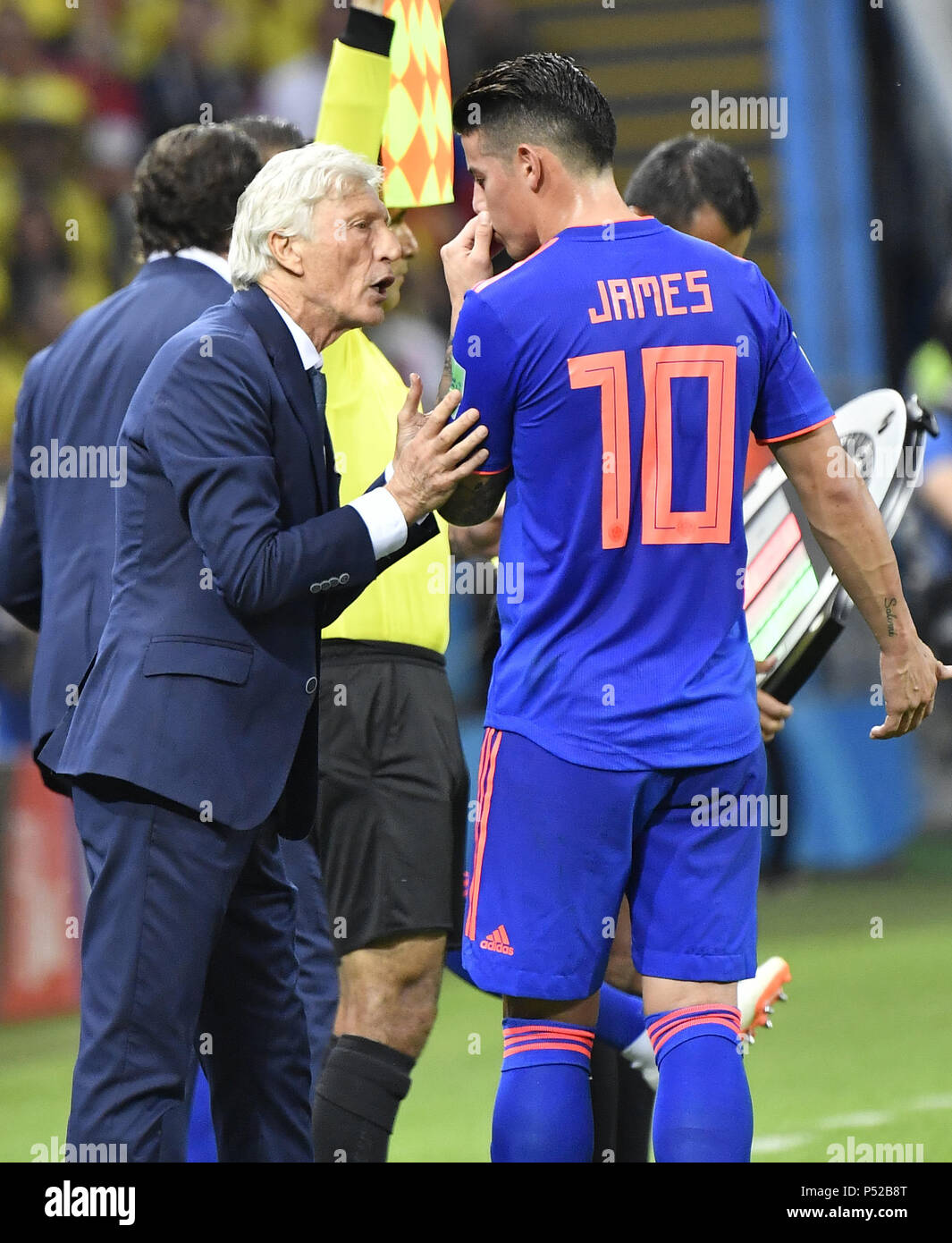 Kazan, Russia. 24th June, 2018. Head coach Jose Pekerman (L) of Colombia gives instructions to James Rodriguez during the 2018 FIFA World Cup Group H match between Poland and Colombia in Kazan, Russia, June 24, 2018. Credit: He Canling/Xinhua/Alamy Live News Stock Photo