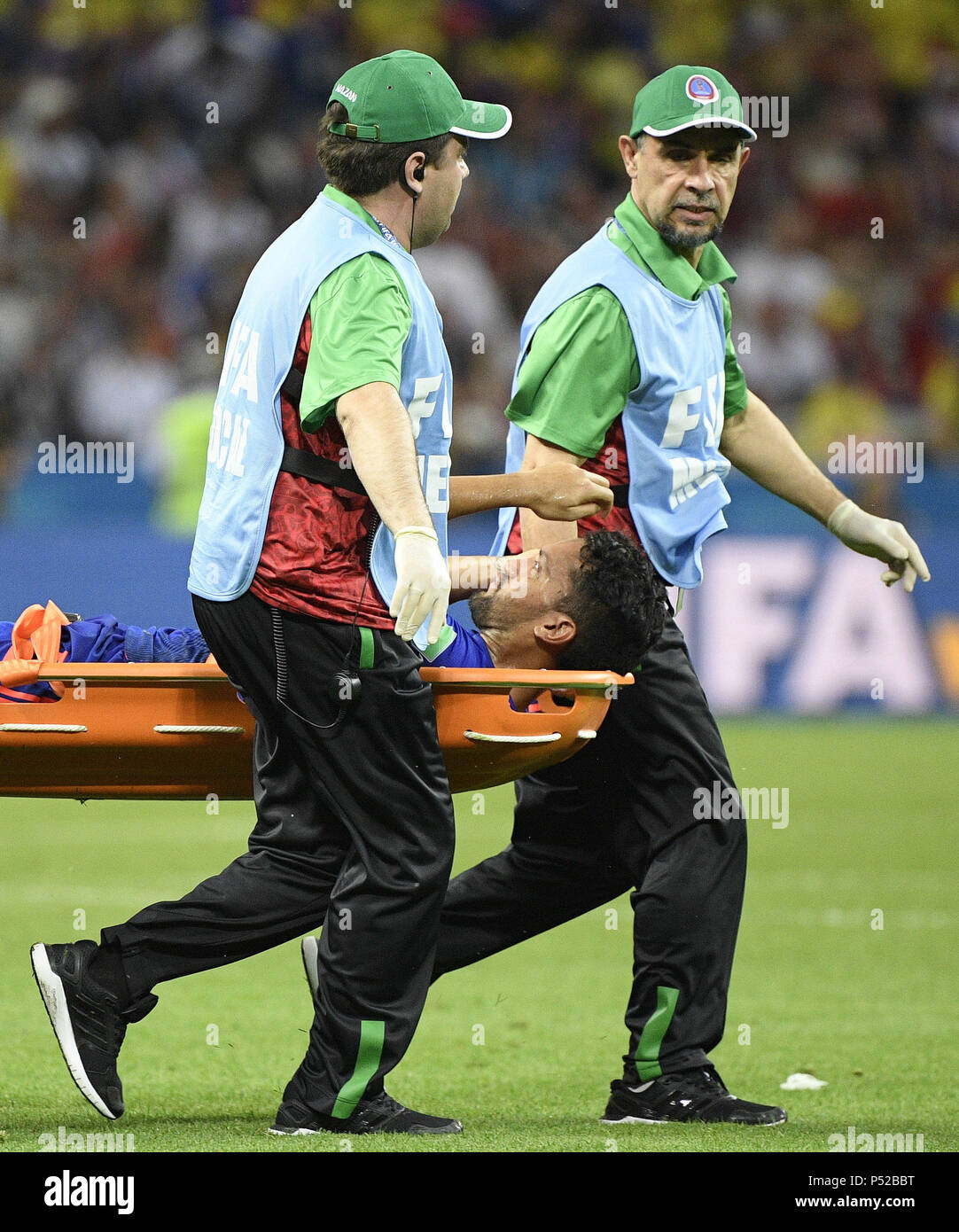 Kazan, Russia. 24th June, 2018. Abel Aguilar of Colombia is carried out of the pitch after his injury during the 2018 FIFA World Cup Group H match between Poland and Colombia in Kazan, Russia, June 24, 2018. Credit: Lui Siu Wai/Xinhua/Alamy Live News Stock Photo