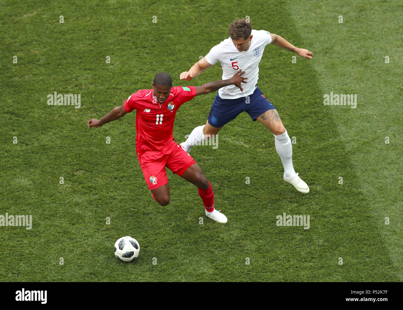 Panama's Armando Cooper and England's John Stones battle for the ballbattle for the ball during the FIFA World Cup Group G match at the Nizhny Novgorod Stadium. Stock Photo