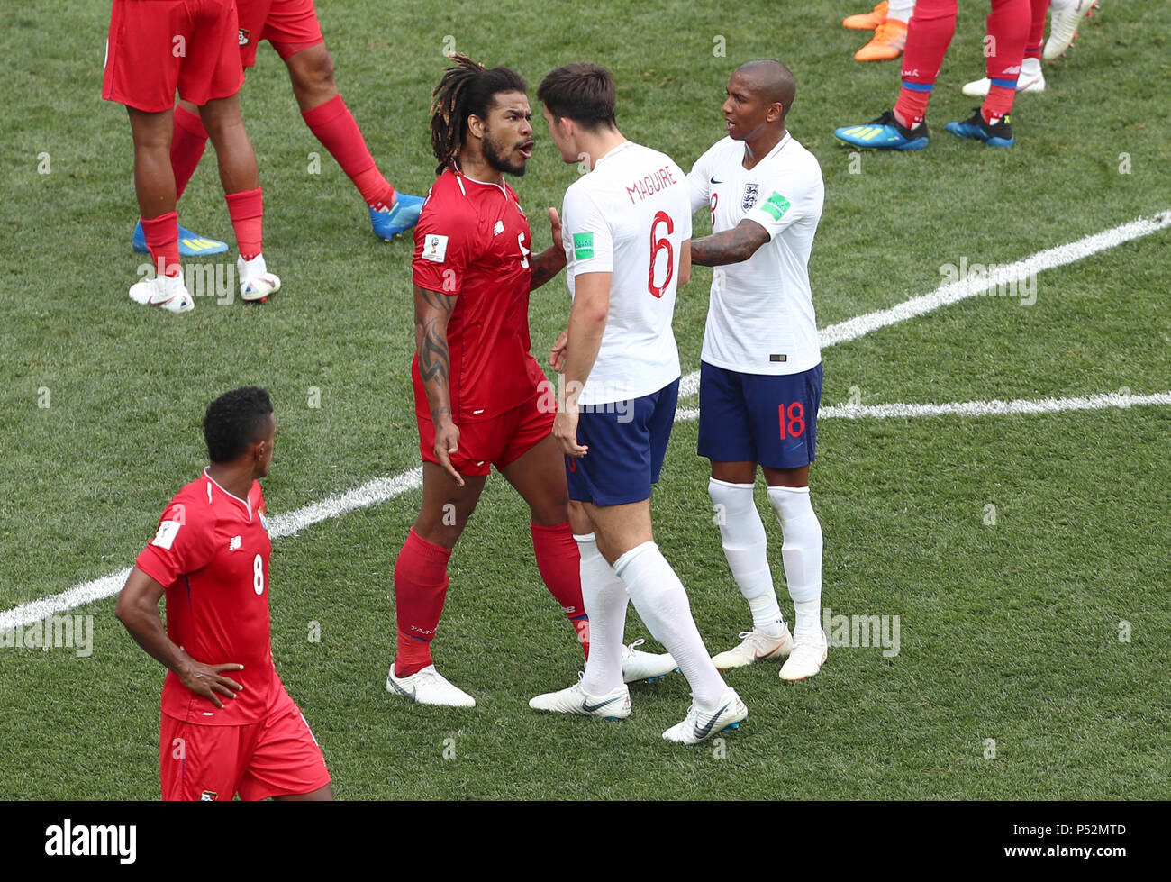 Panama's Roman Torres (left) and England's Harry Maguire exhchange words during the FIFA World Cup Group G match at the Nizhny Novgorod Stadium. Stock Photo