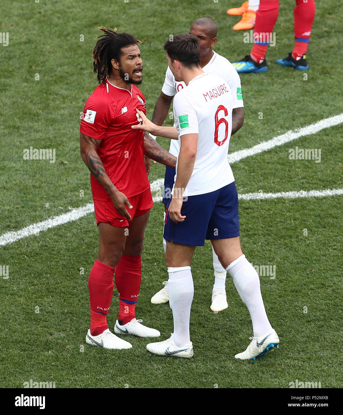 Panama's Roman Torres (left) and England's Harry Maguire exhchange words during the FIFA World Cup Group G match at the Nizhny Novgorod Stadium. Stock Photo