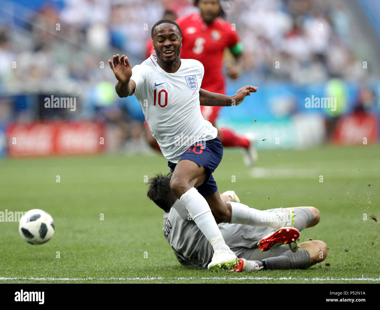 England's Raheem Sterling (top) and Panama's Jaime Penedo battle for the ball during the FIFA World Cup Group G match at the Nizhny Novgorod Stadium. Stock Photo