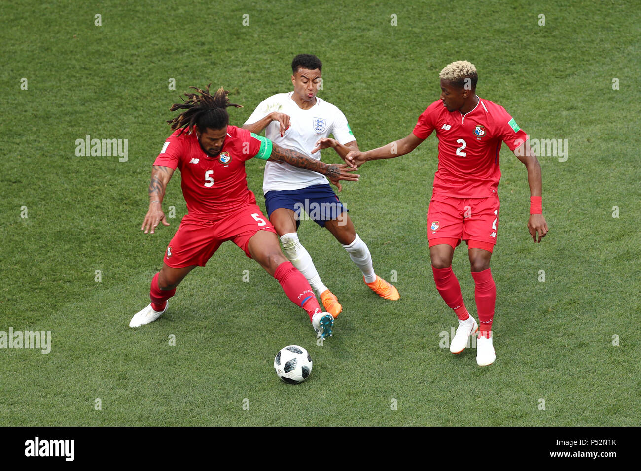 Panama's Roman Torres (left), England's Jesse Lingard and Panama's Michael Amir Murillo battle for the ball during the FIFA World Cup Group G match at the Nizhny Novgorod Stadium. Stock Photo