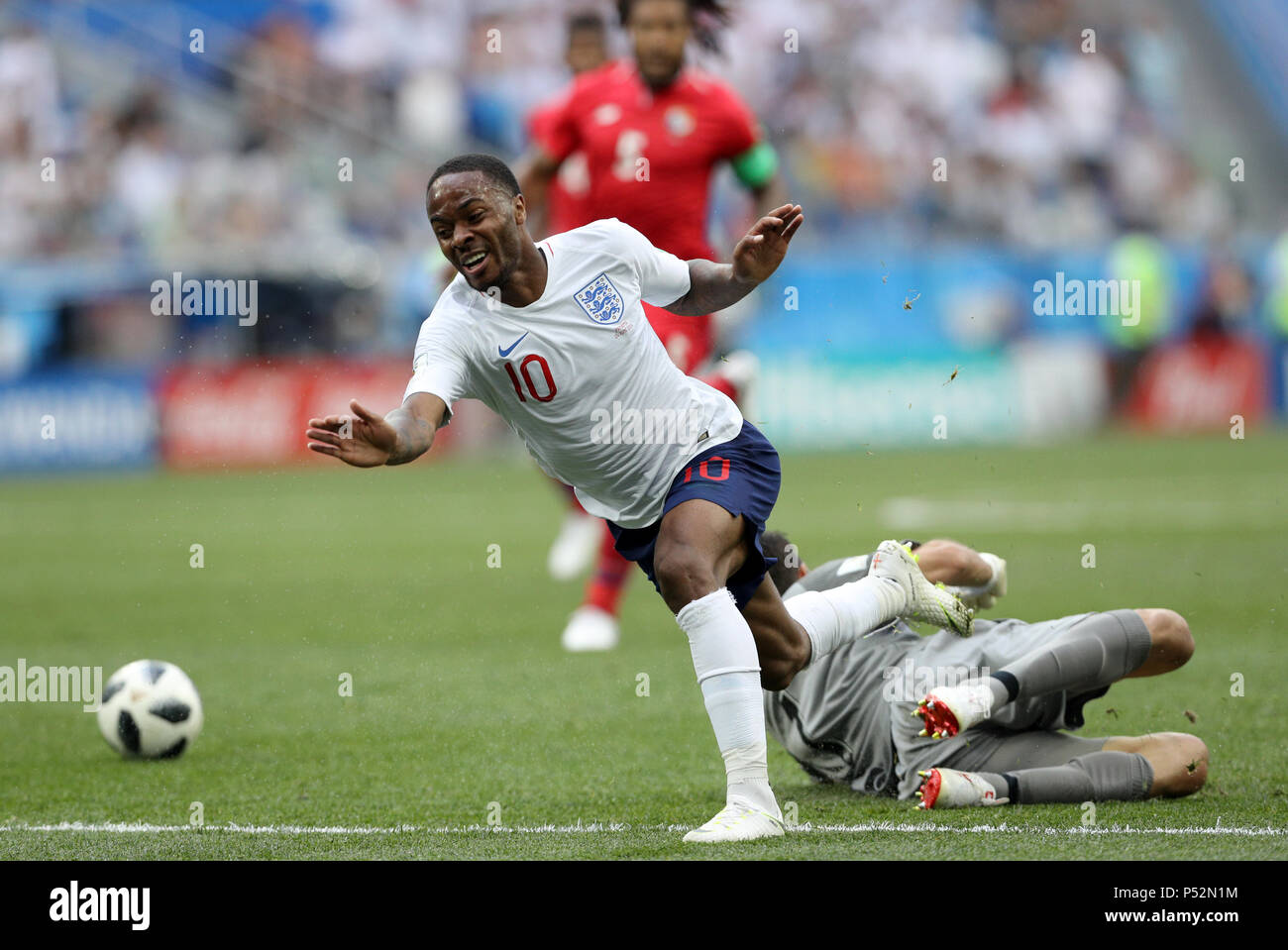 England's Raheem Sterling (top) and Panama's Jaime Penedo battle for the ball during the FIFA World Cup Group G match at the Nizhny Novgorod Stadium. Stock Photo