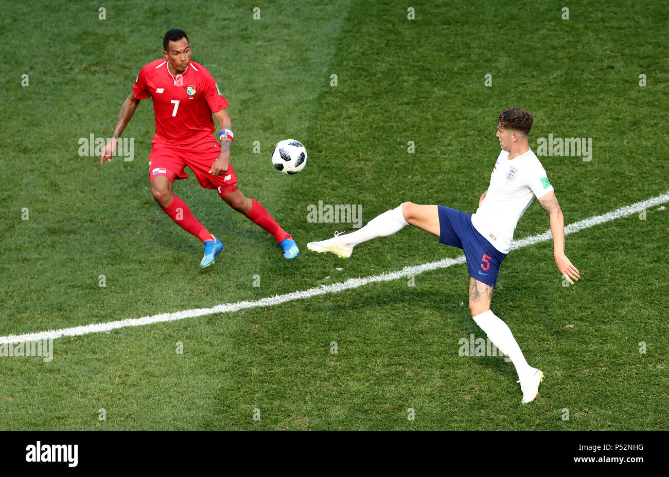 Panama's Blas Perez (left) and England's John Stones battle for the ball during the FIFA World Cup Group G match at the Nizhny Novgorod Stadium. Stock Photo