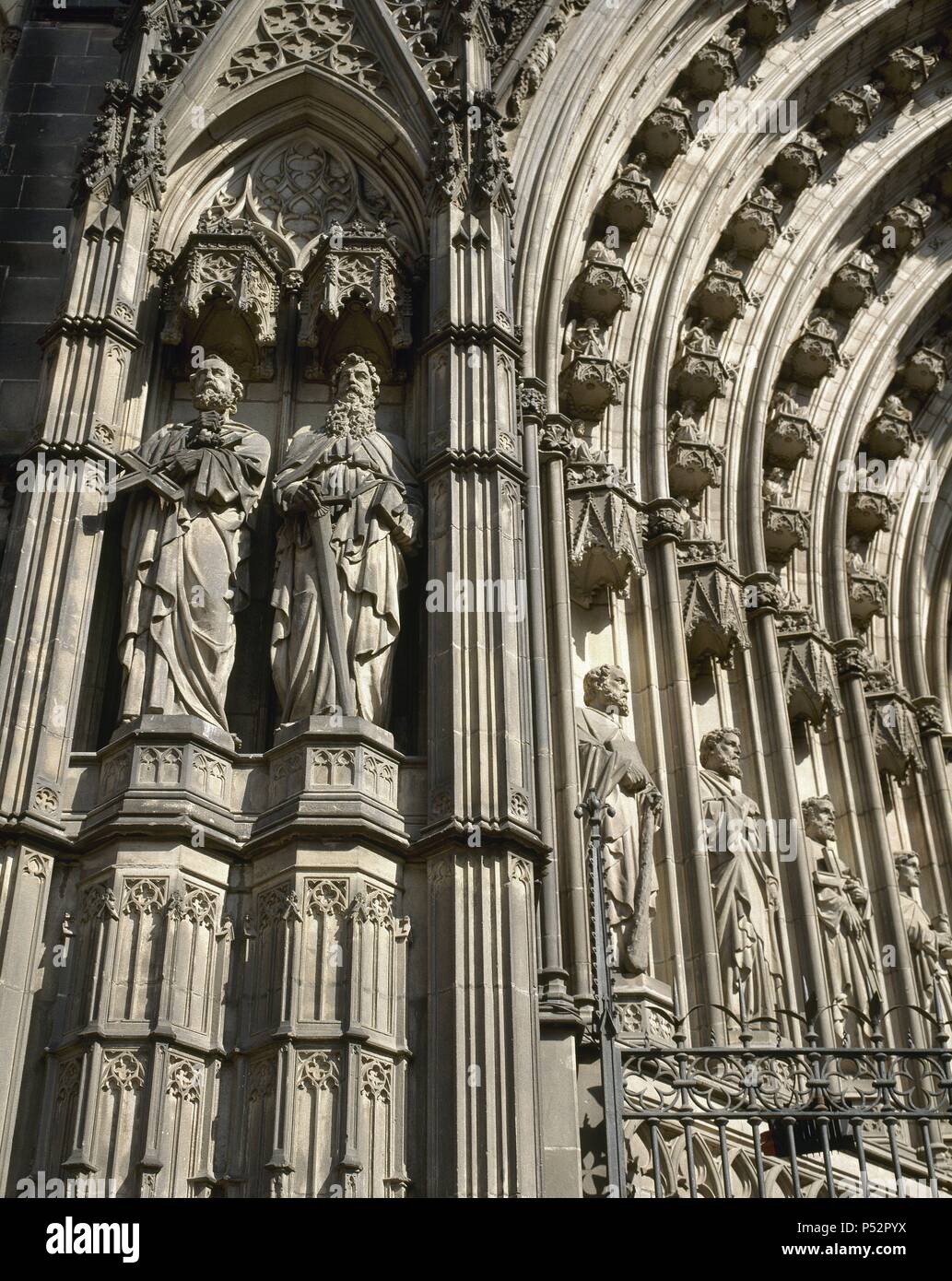 Spain. Barcelona. Cathedral. Archivolts. Detail. The facade was finally finished in the early 20th century, by the architects Josep Oriol Mestres (1815-1895) and August Font i Carreras (1846-1924). Neogothic style. Stock Photo