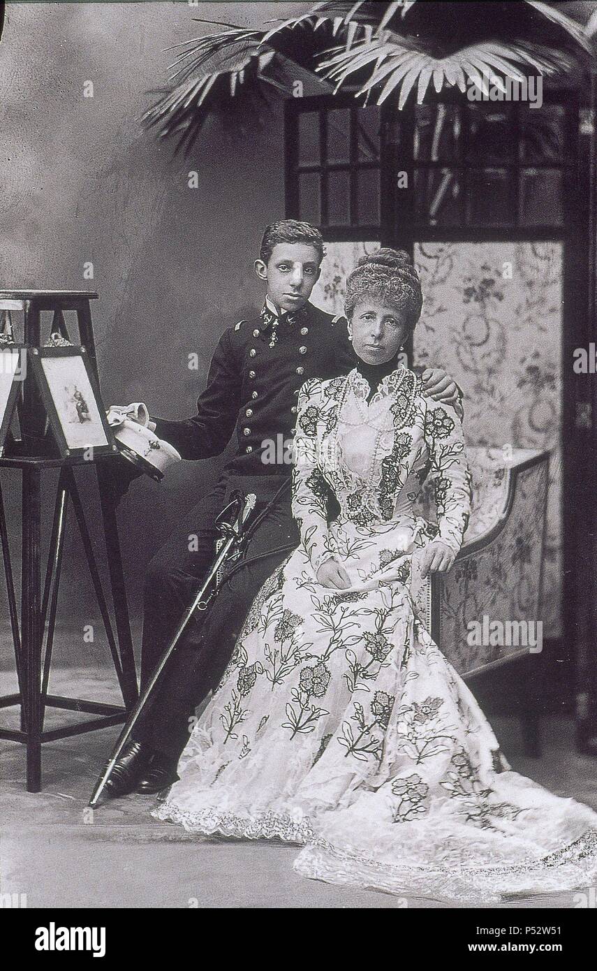 Alfonso XIII of Spain with his mother Maria Christina of Austria, 1900. Stock Photo
