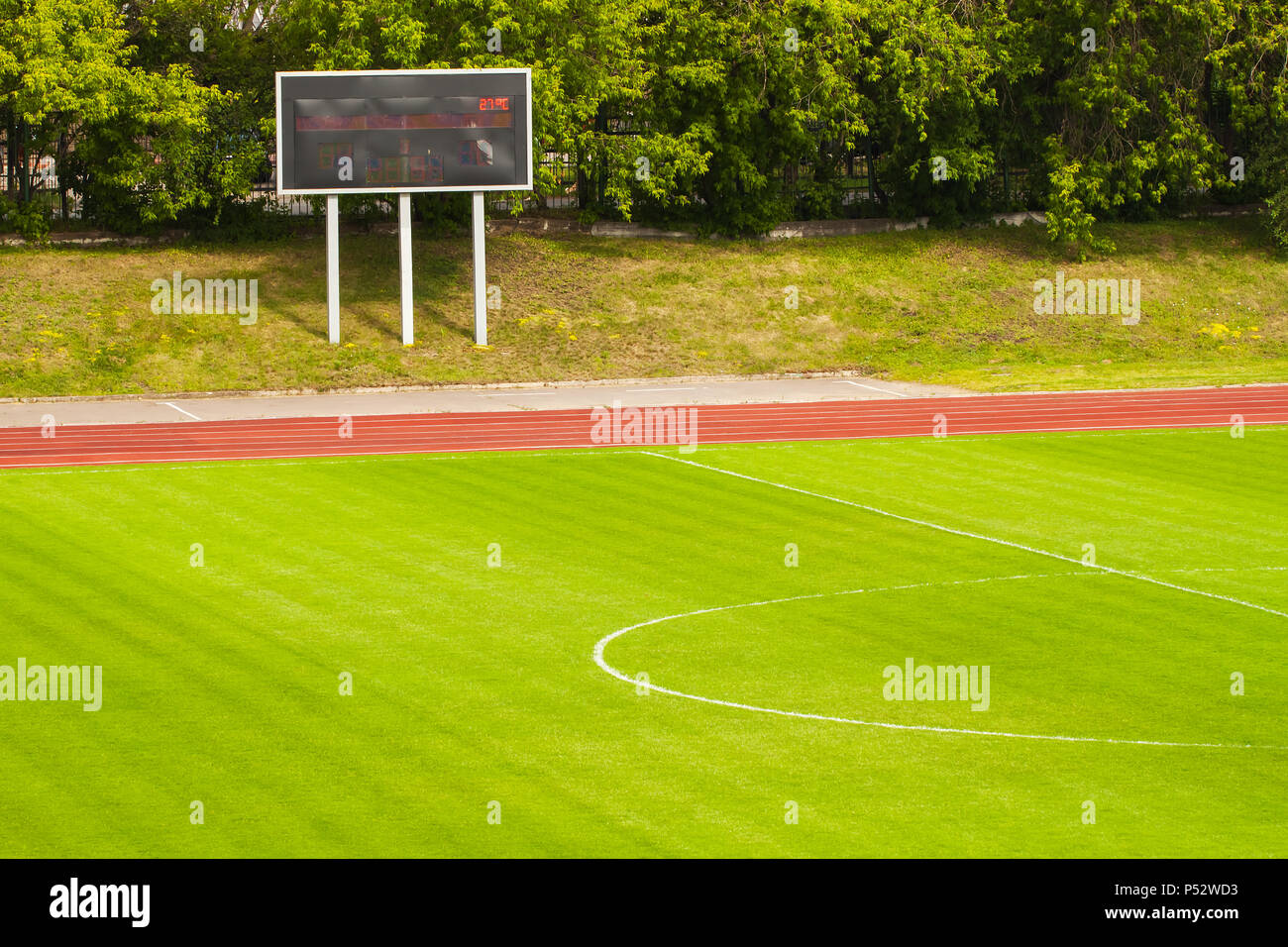 Football field and scoreboard Stock Photo