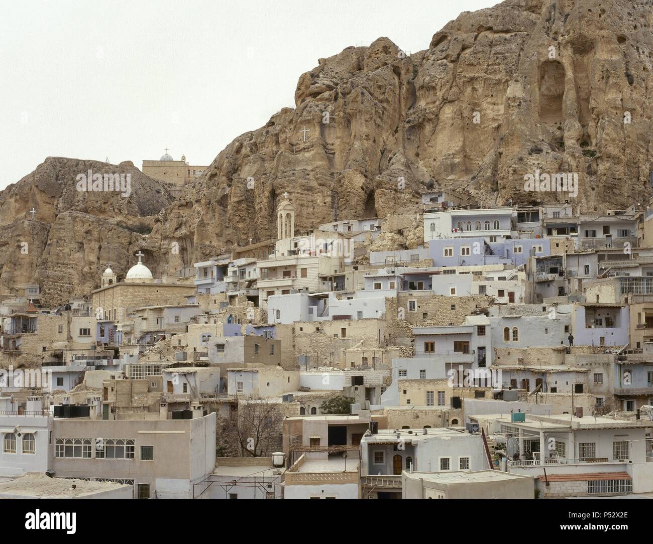 Syria. Ma«loula. Town built into the rugged mountainside. Village where Western Aramaic is still spoken. Near East. Photo before Syrian Civil War. Stock Photo