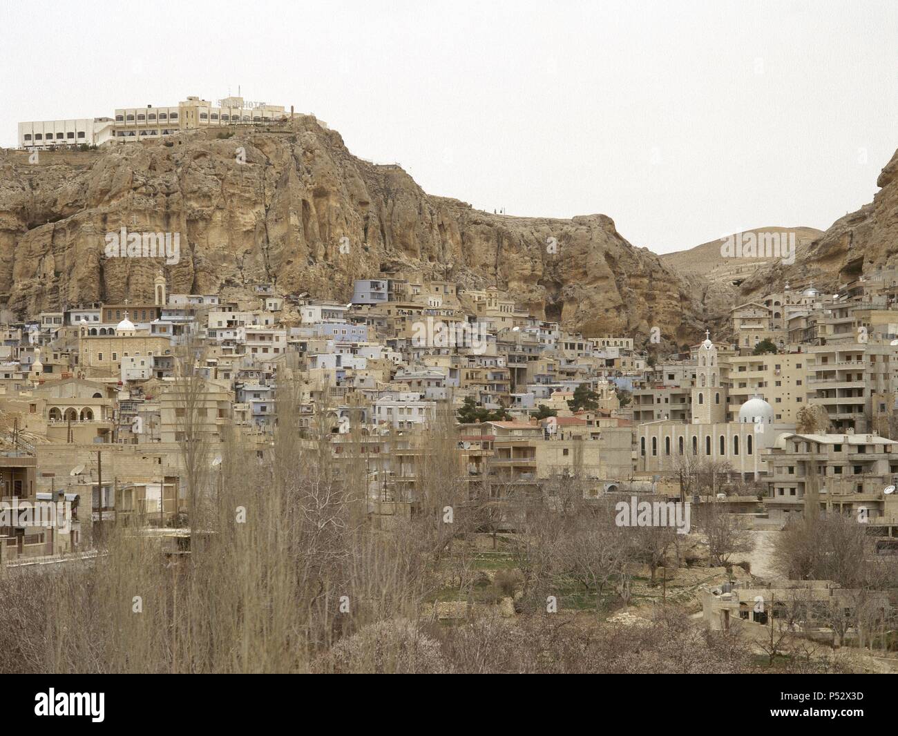 Syria. Ma«loula. Town built into the rugged mountainside. Village where Western Aramaic is still spoken. Near East. Photo before Syrian Civil War. Stock Photo