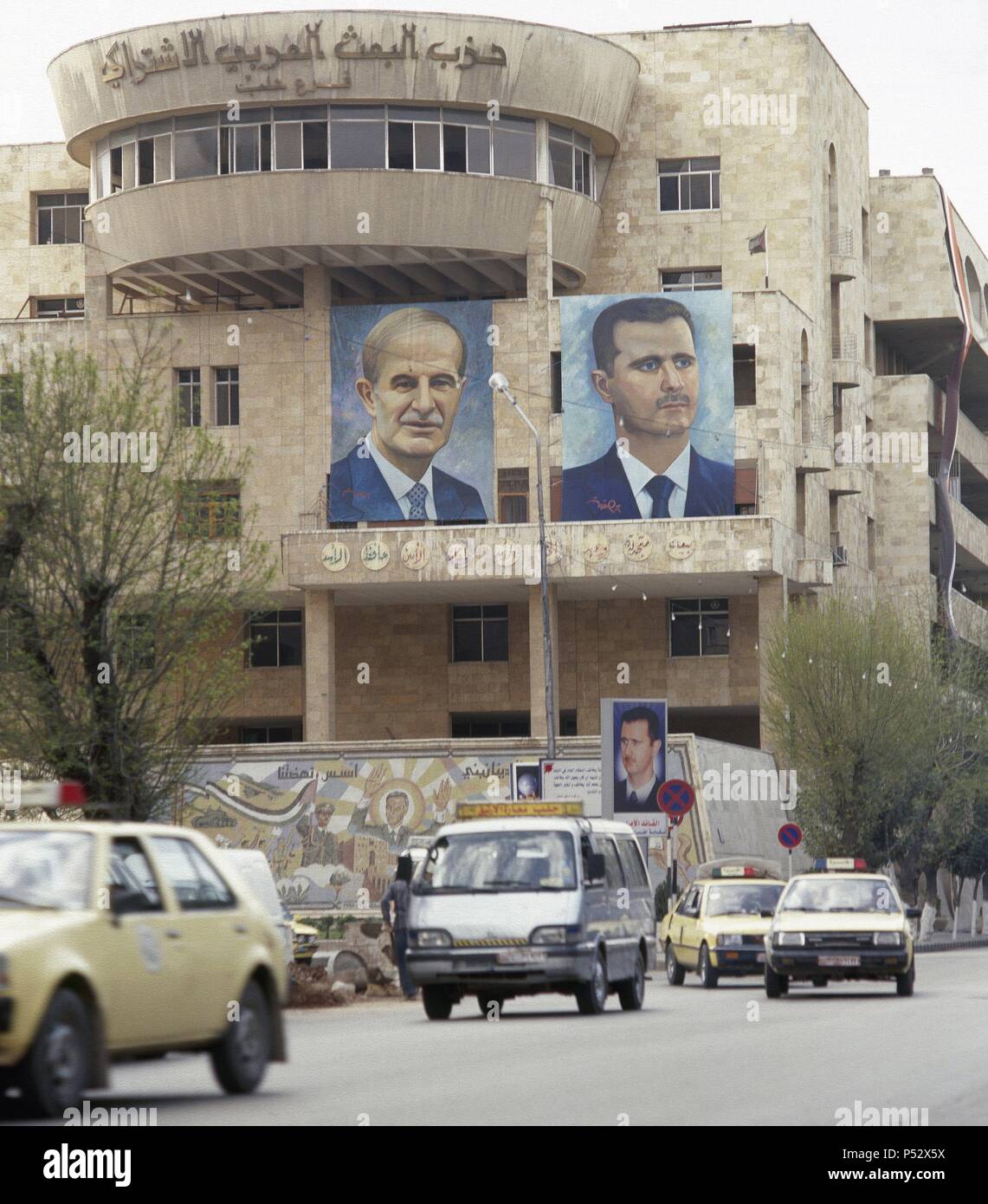 Syria. Damascus. Poster with portraits of presidents Hafez Al-Hassad (1930-2000) and Bashar al-Assad (b. 1965). Photo before Syrian Civil War. Stock Photo