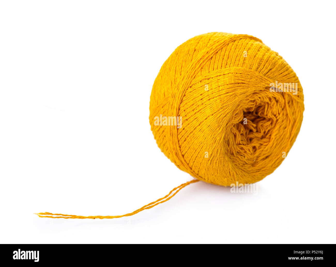 Yellow wool yarn ball isolated on white background, Stock image