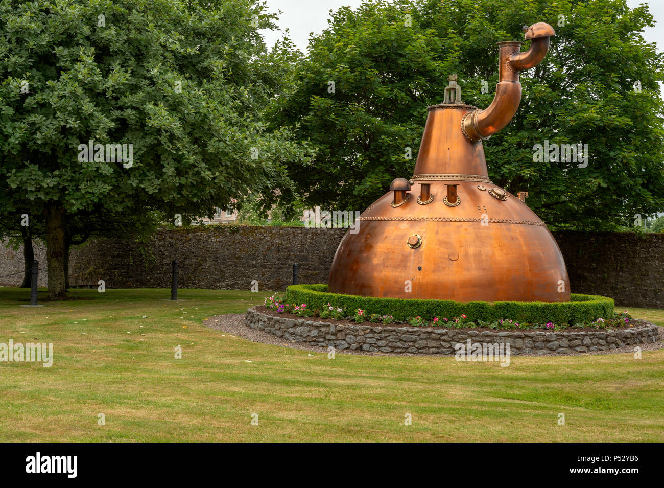 The emblematic Copper Still Pot at the entrance of the Old Jameson Whiskey Distillery in Midleton, County Cork, Ireland. The Jameson Experience tour. Stock Photo