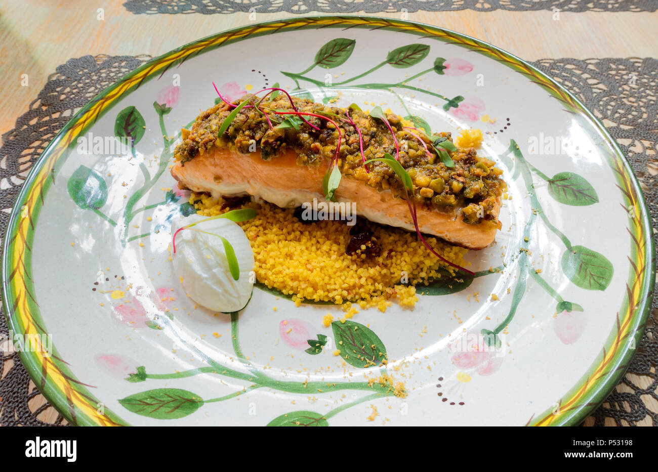 Grilled pistachiocrusted salmon and yellow rice Stock Photo Alamy