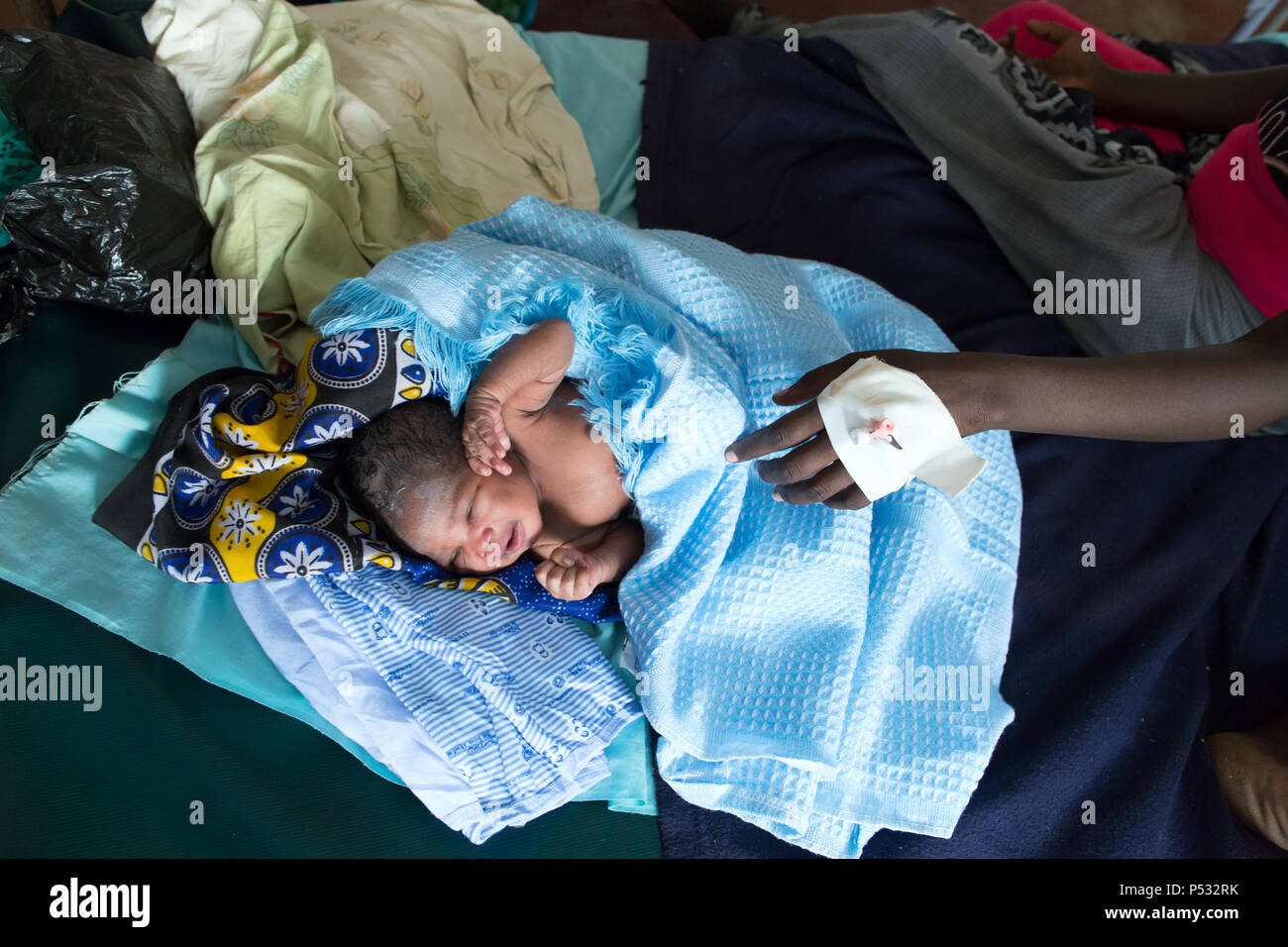 Kakuma, Kenya - Newborn in the maternal birth station of the Johanniter foreign aid in the refugee camp Kakuma. Stock Photo