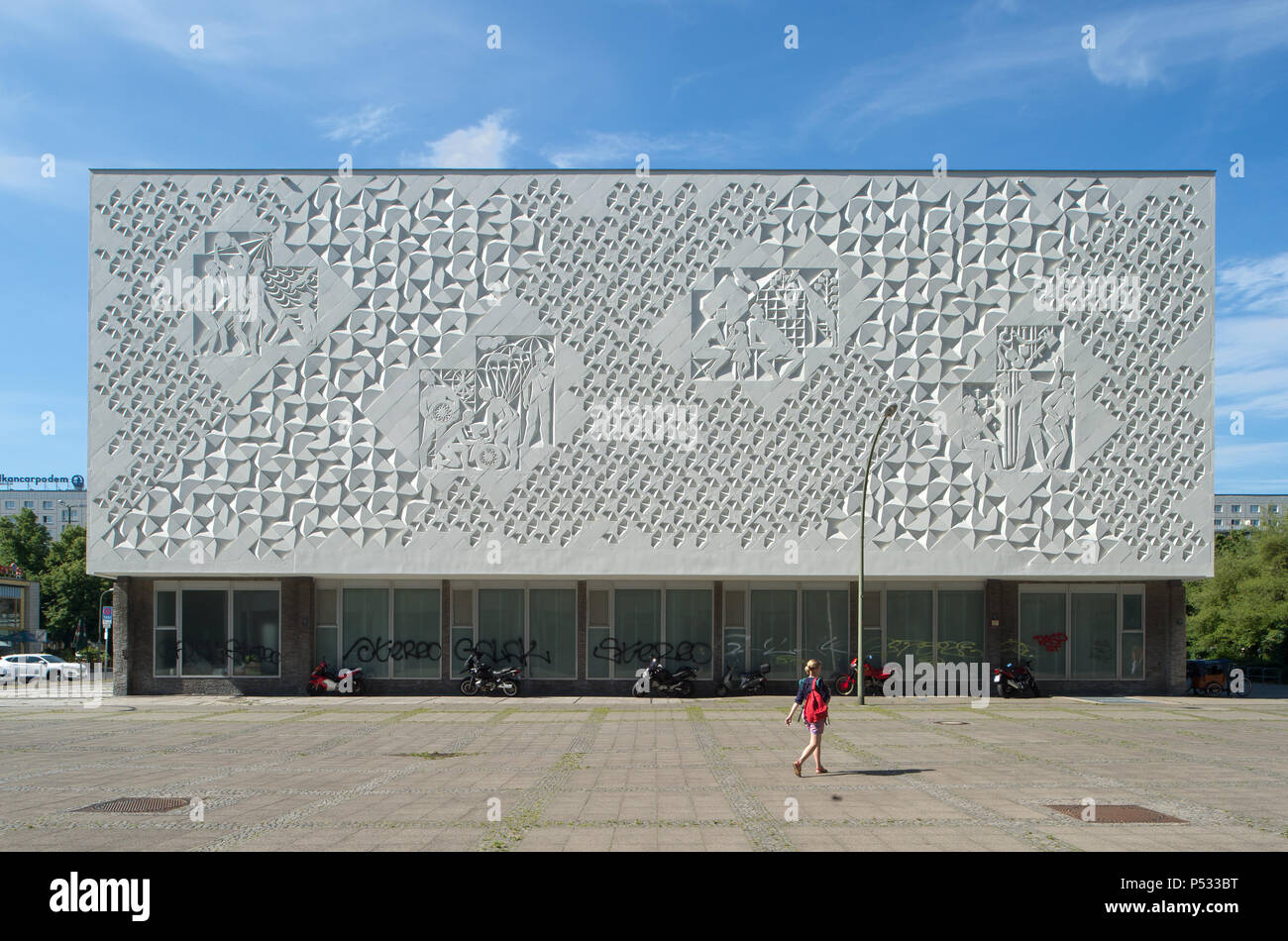 Sculpture relief on the outside facade of the back of the Kino International in Berlin-Mitte Stock Photo