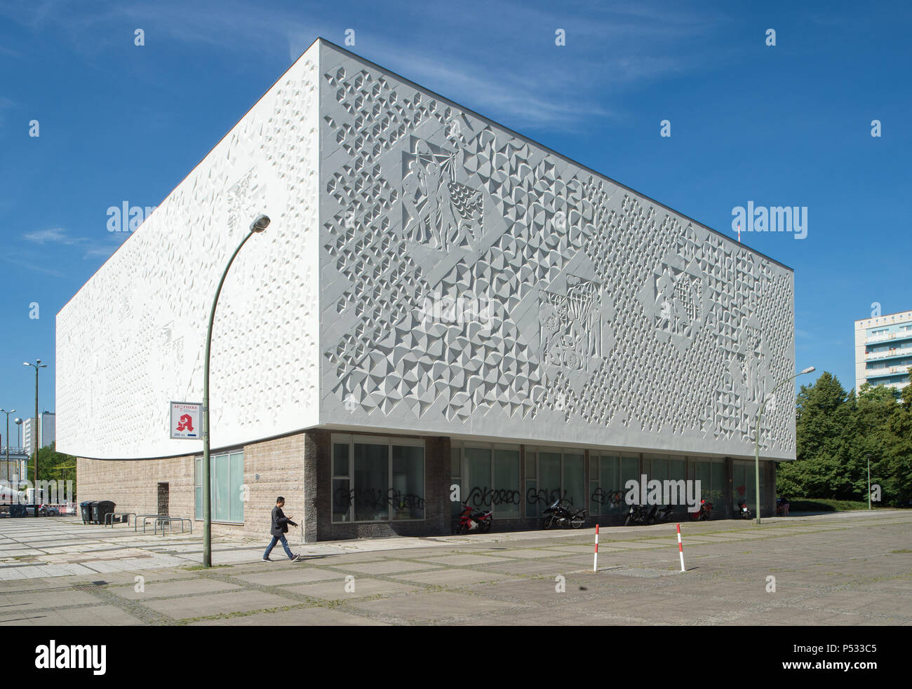 Sculpture relief on the exterior facade of Kino International in Berlin ...