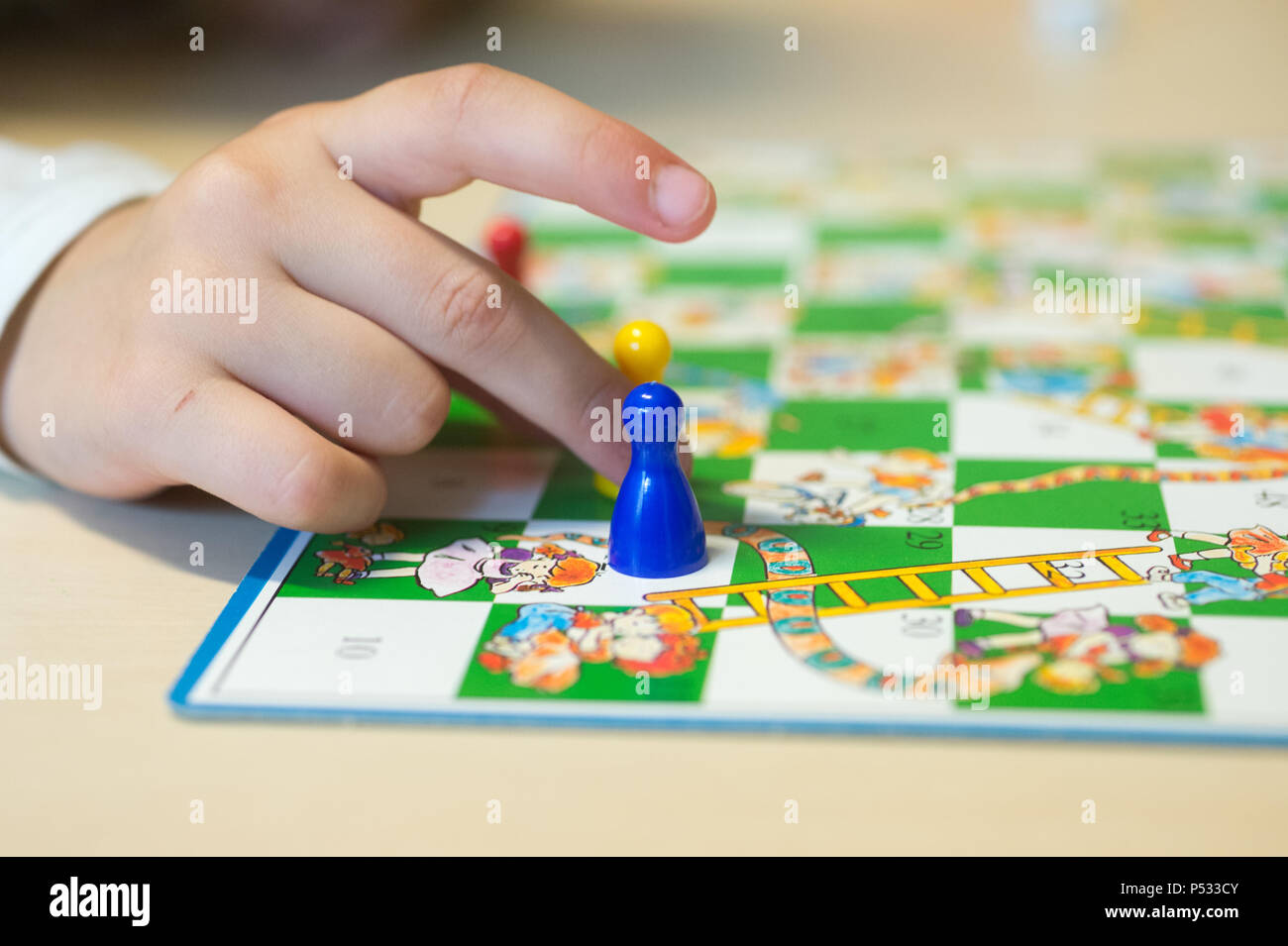 Children at the board game Stock Photo