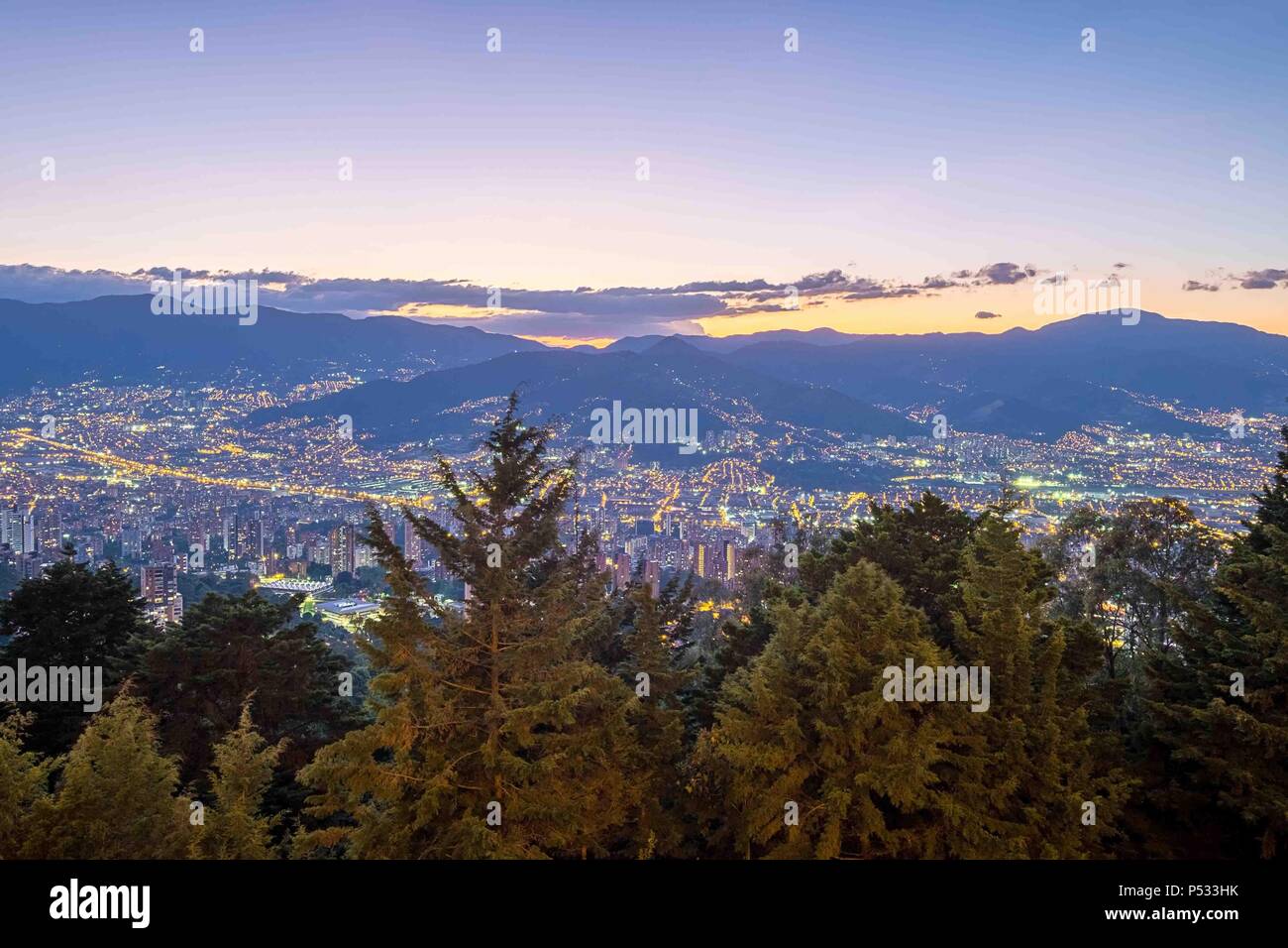 Panoramic View of Medellin at night from Las Palmas Stock Photo