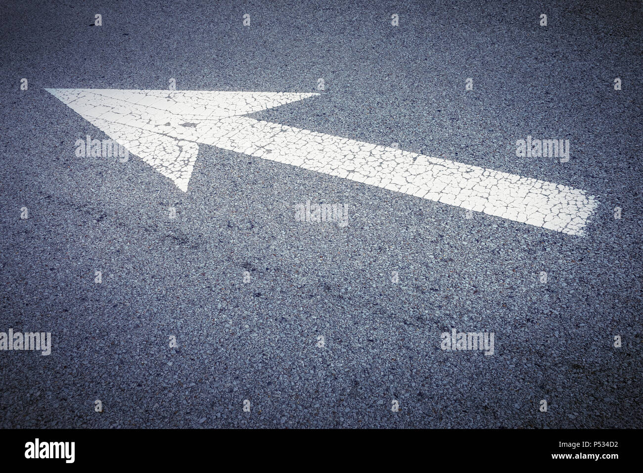 an image of an arrow sign on the road Stock Photo