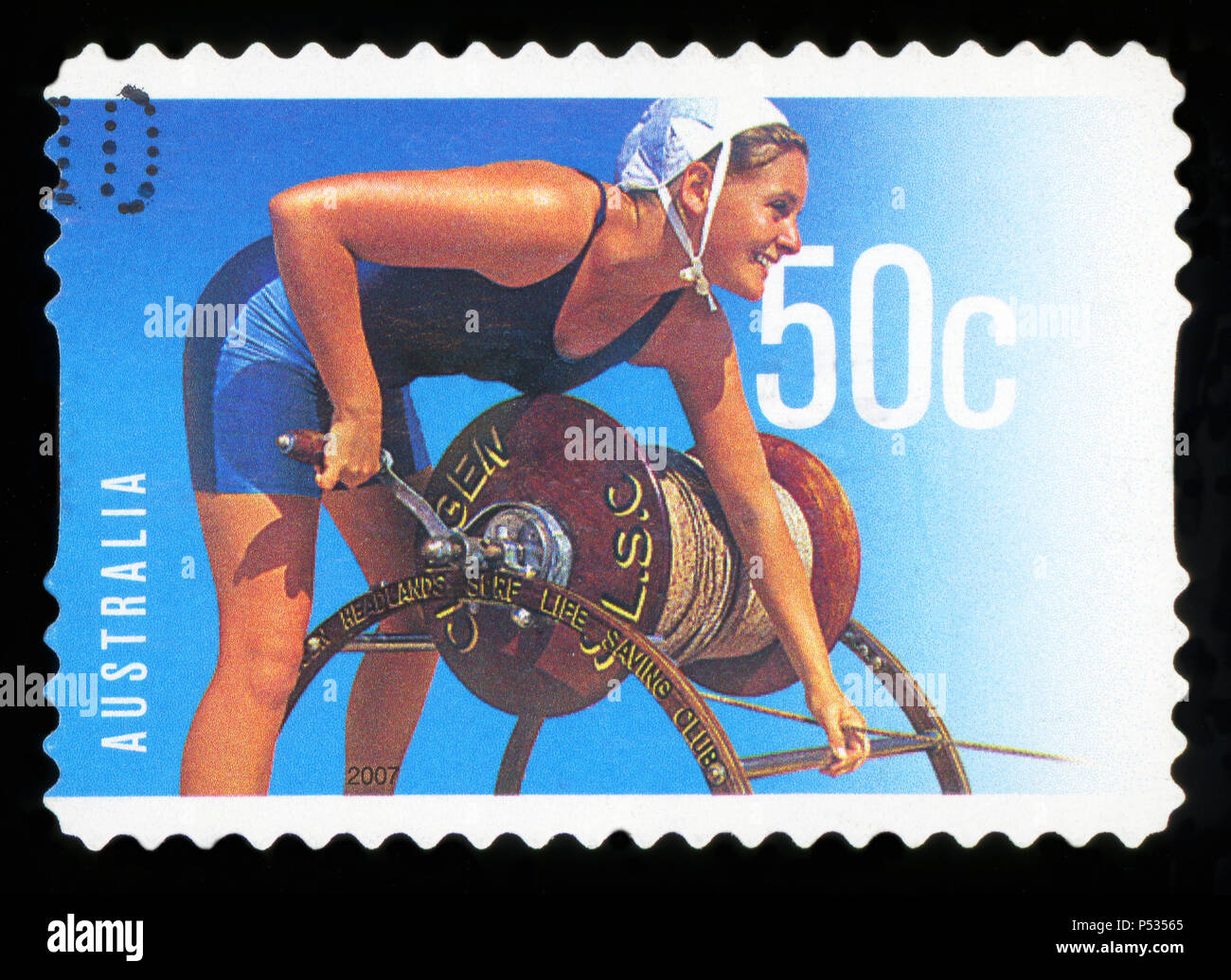 AUSTRALIA - CIRCA 2007: A stamp printed in Australia shows women winding rope and the inscription headlands surf life saving club, circa 2007 Stock Photo