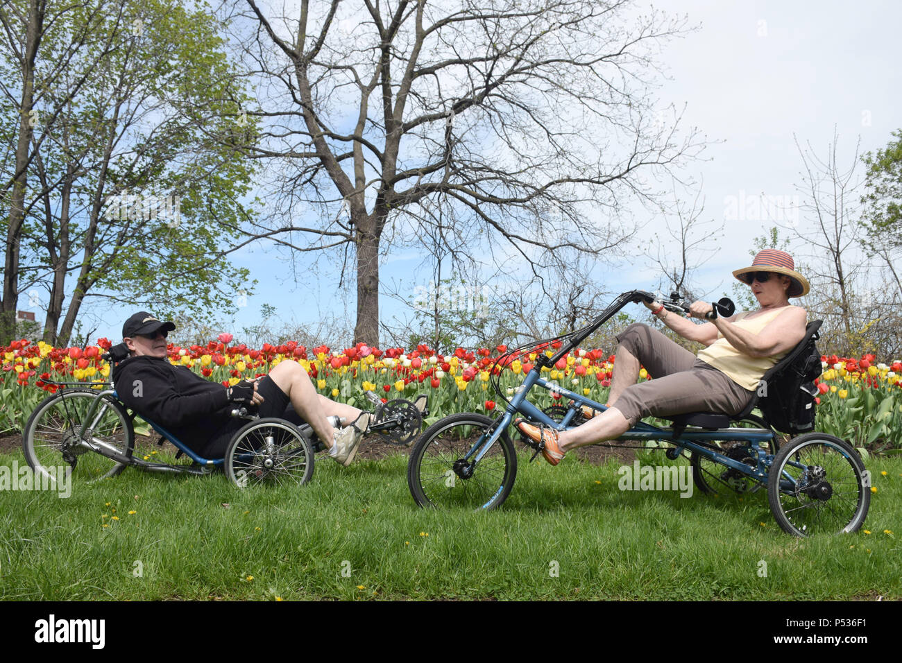Riding a tricycle Stock Photo Alamy