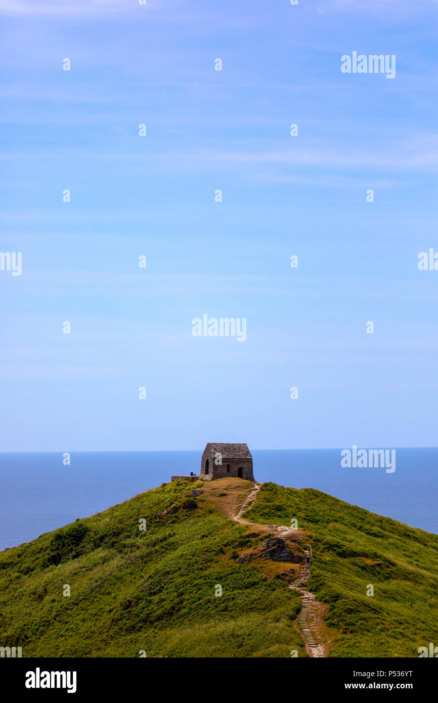 Rame Head Chapel on the Rame Peninsula at Whitsand Bay, Cornwall on a hot summers days Stock Photo