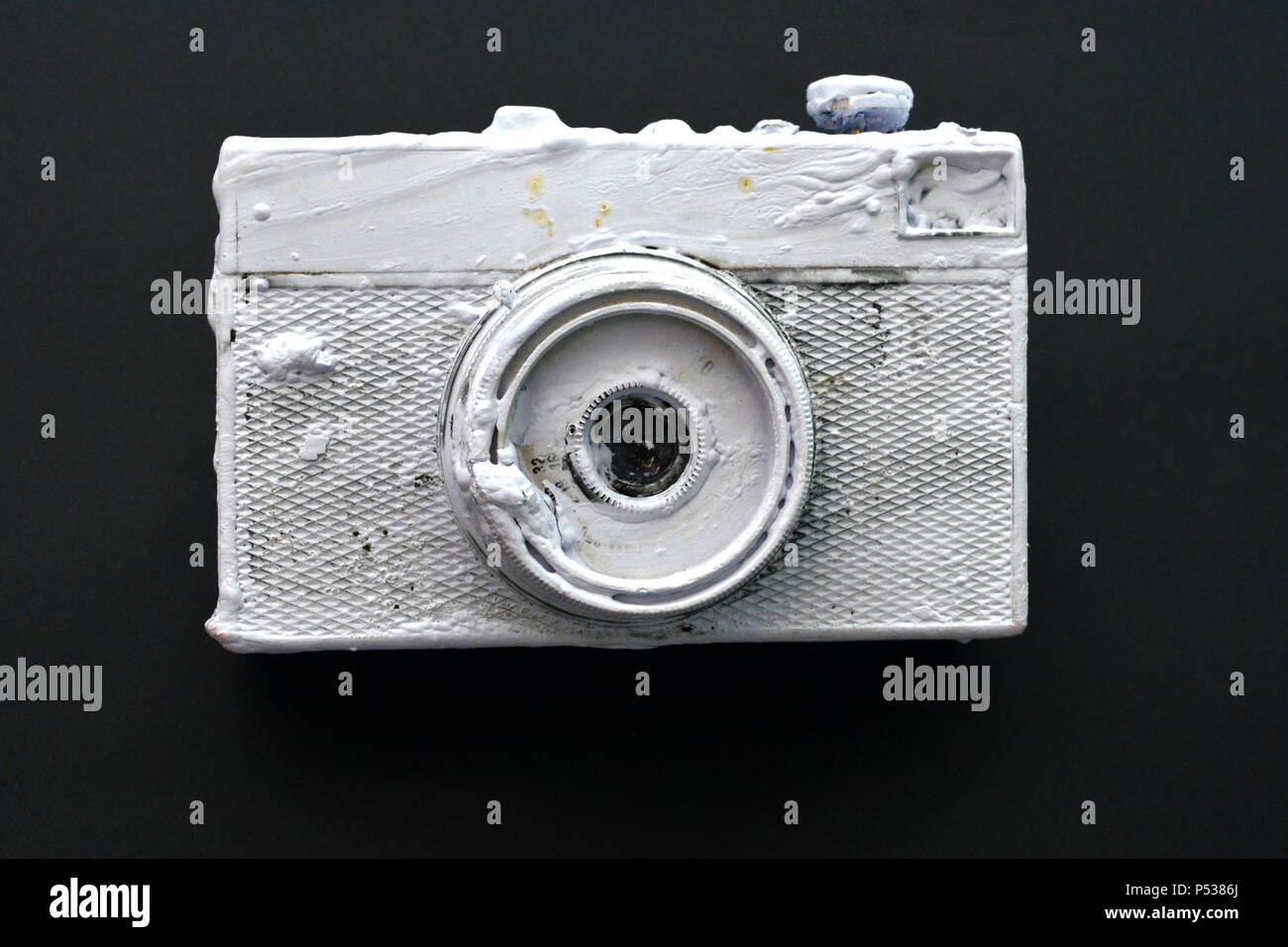 vintage film camera painted with wall paint on black,image of a Stock ...