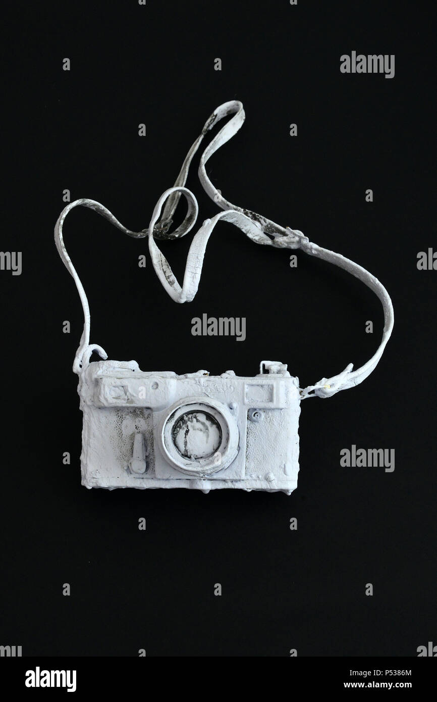 vintage film camera painted with wall paint on black,image of a Stock ...