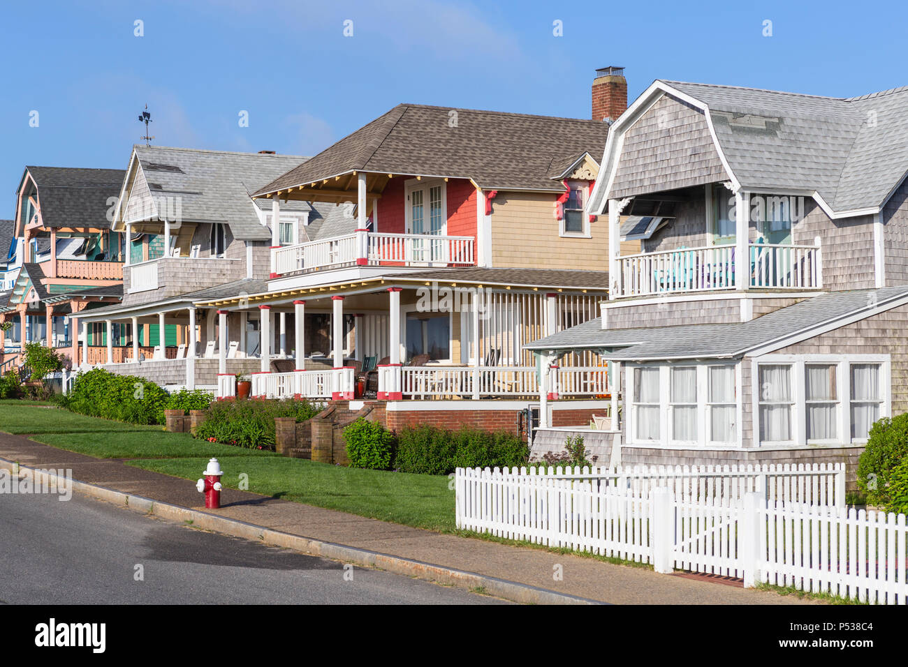 Homes, many available for summer rentals, on Ocean Avenue in Oak Bluffs, Massachusetts on Martha's Vineyard. Stock Photo