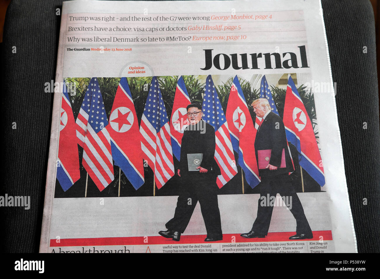 Donald Trump meeting Kim Jong-Un in Singapore on Guardian Journal newspaper front page 13 June 2018 Stock Photo