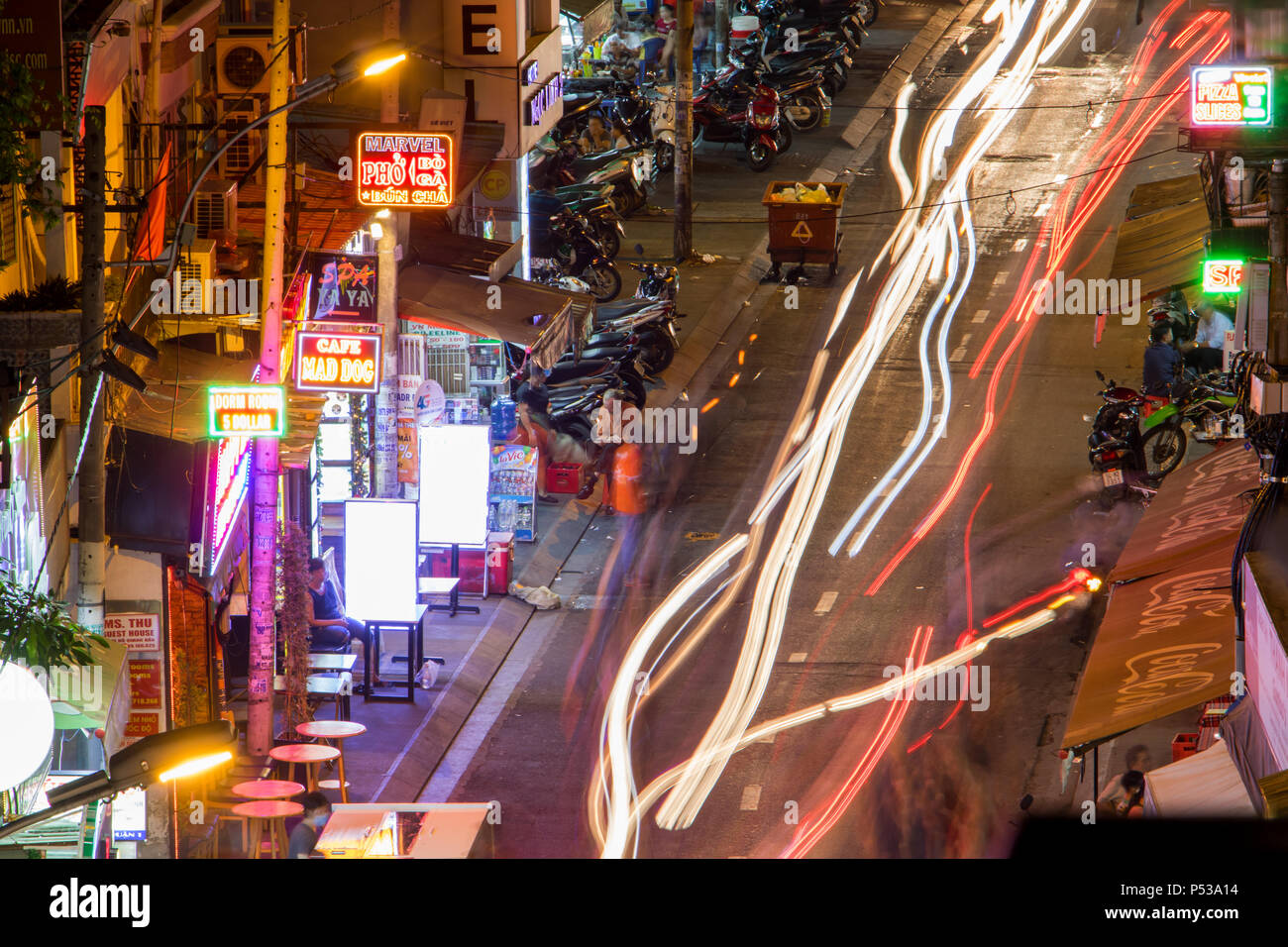 SAIGON, VIETNAM, DEC 13 2017, Traffic in the streets of Saigon City. Life in night Ho Chi Minh city. Stock Photo