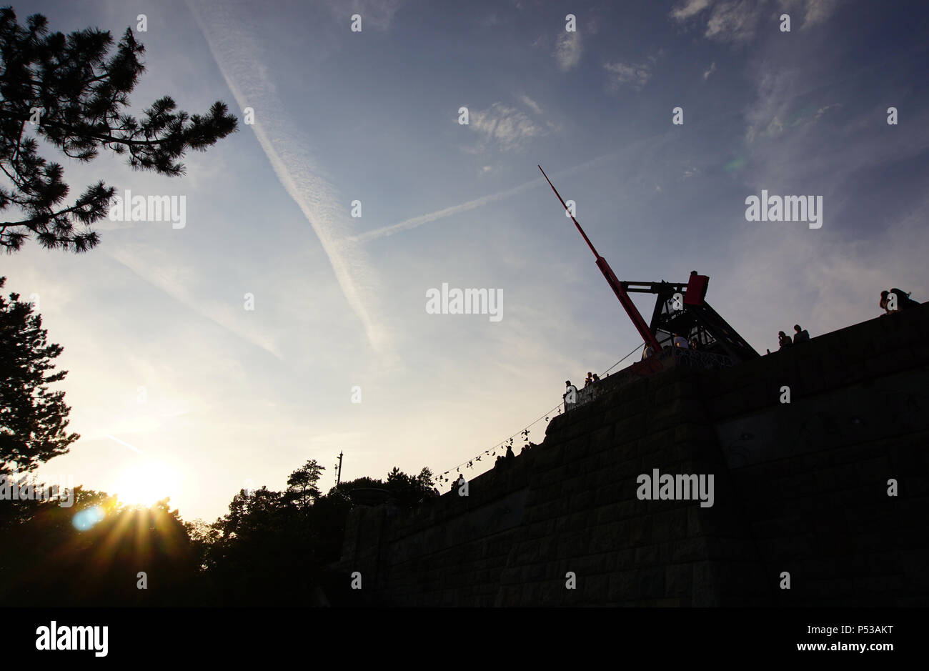 A silhouette of the iconic metronome in Letna Park, Prague (Czech Republic) taken towards the end of the day. Stock Photo